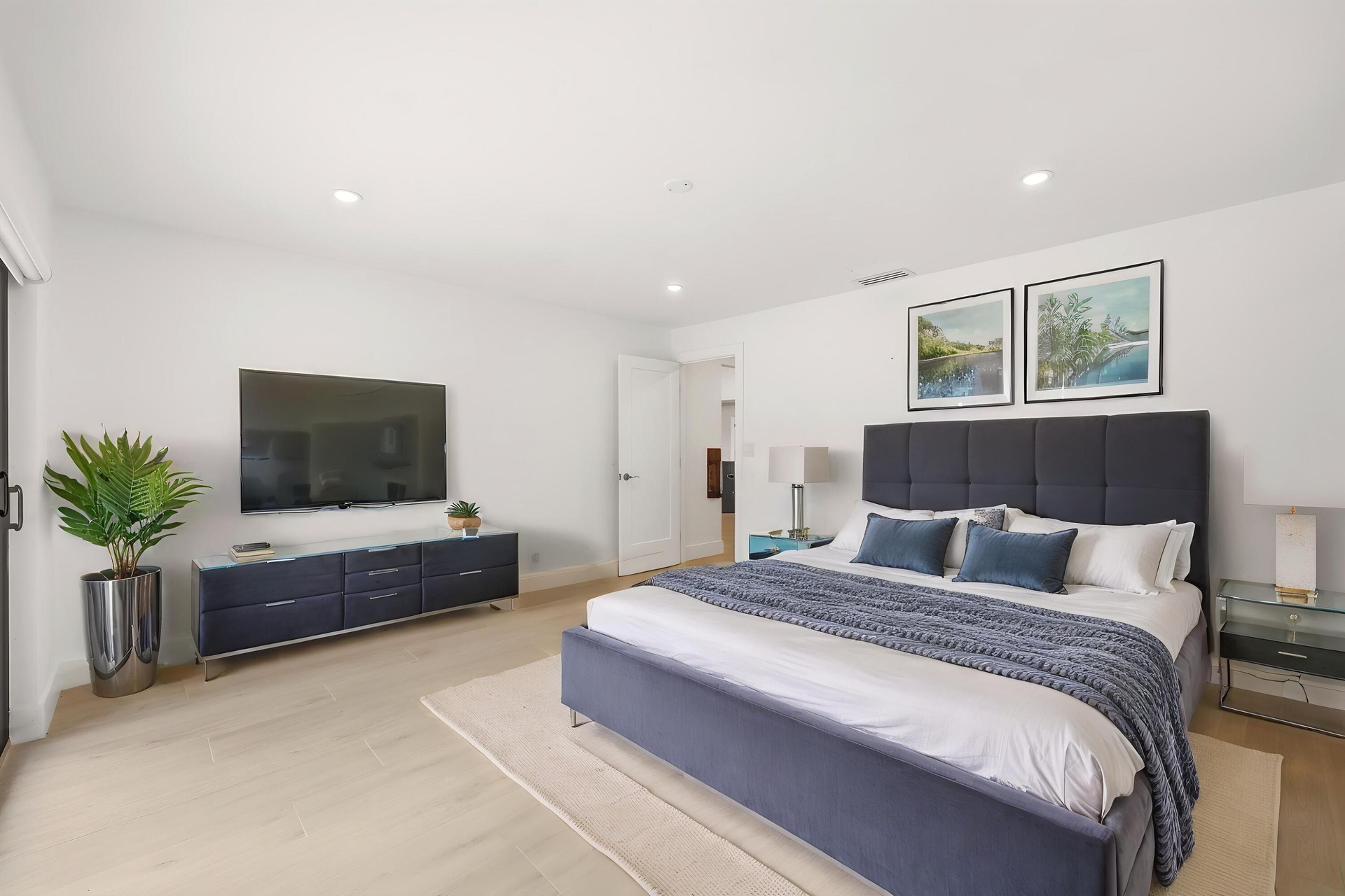 Designed as a true private guest retreat, this spacious suite offers exceptional comfort, privacy, and direct access to the backyard through oversized
