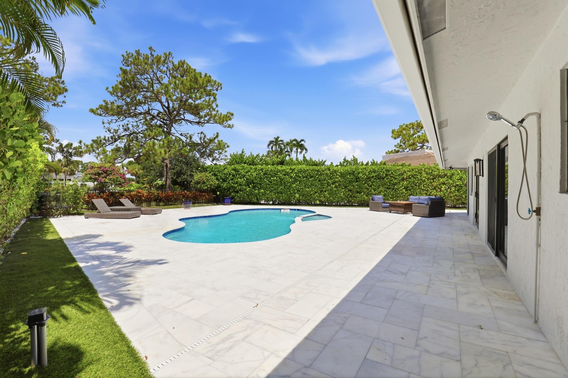 Discover your own private backyard sanctuary where modern luxury meets the natural beauty of Old Florida. Backing directly to a nature preserve, this 