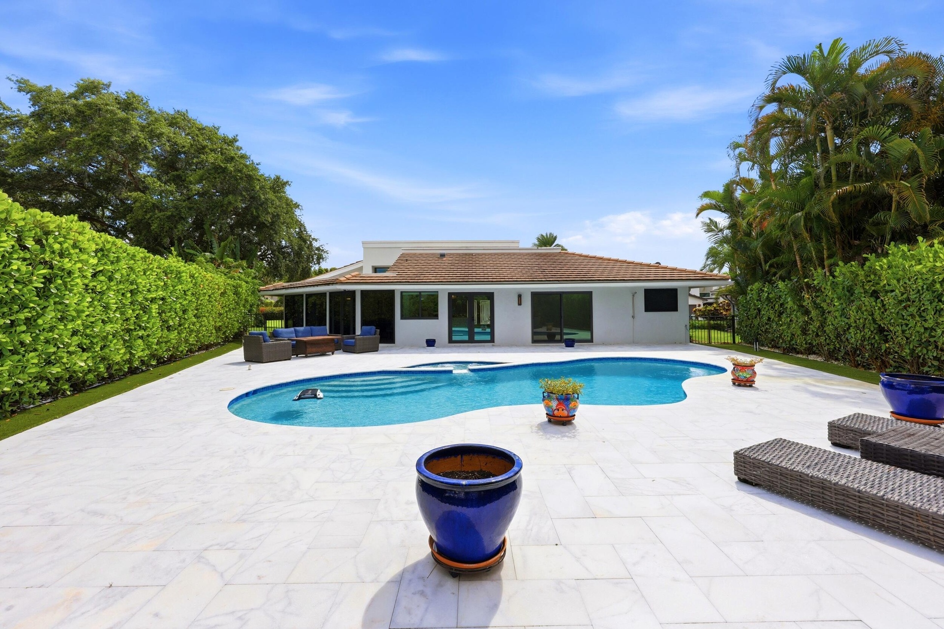 Discover your own private backyard sanctuary where modern luxury meets the natural beauty of Old Florida. Backing directly to a nature preserve, this 