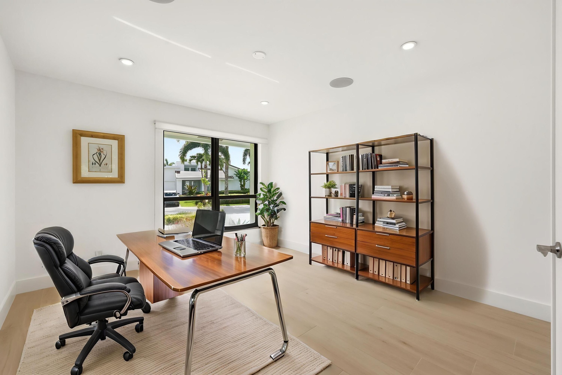 Currently configured as a sophisticated home office, this bright and versatile room easily adapts to fit your lifestyle as a guest bedroom, den, or cr