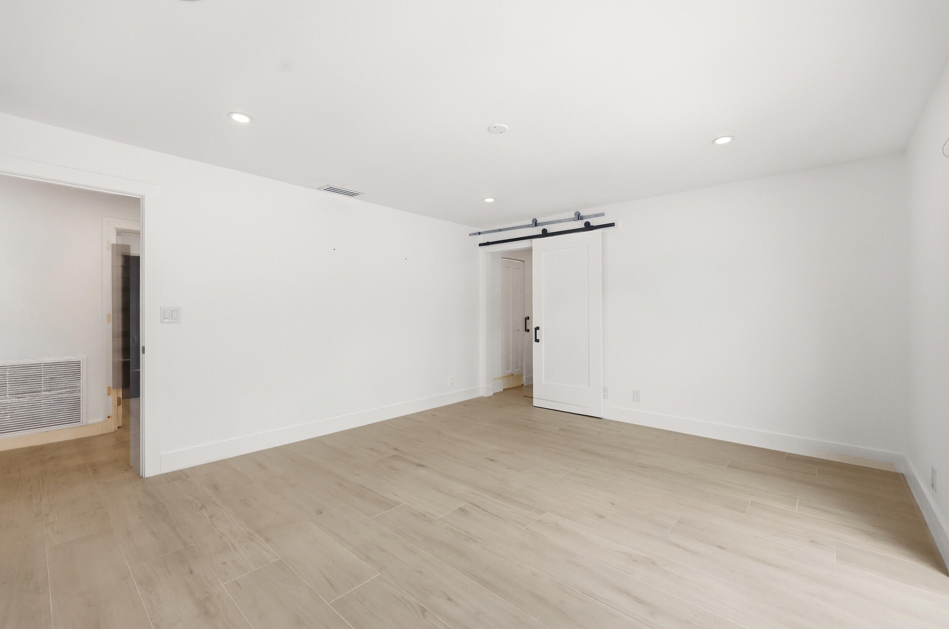 Designed as a true private guest retreat, this spacious suite offers exceptional comfort, privacy, and direct access to the backyard through oversized
