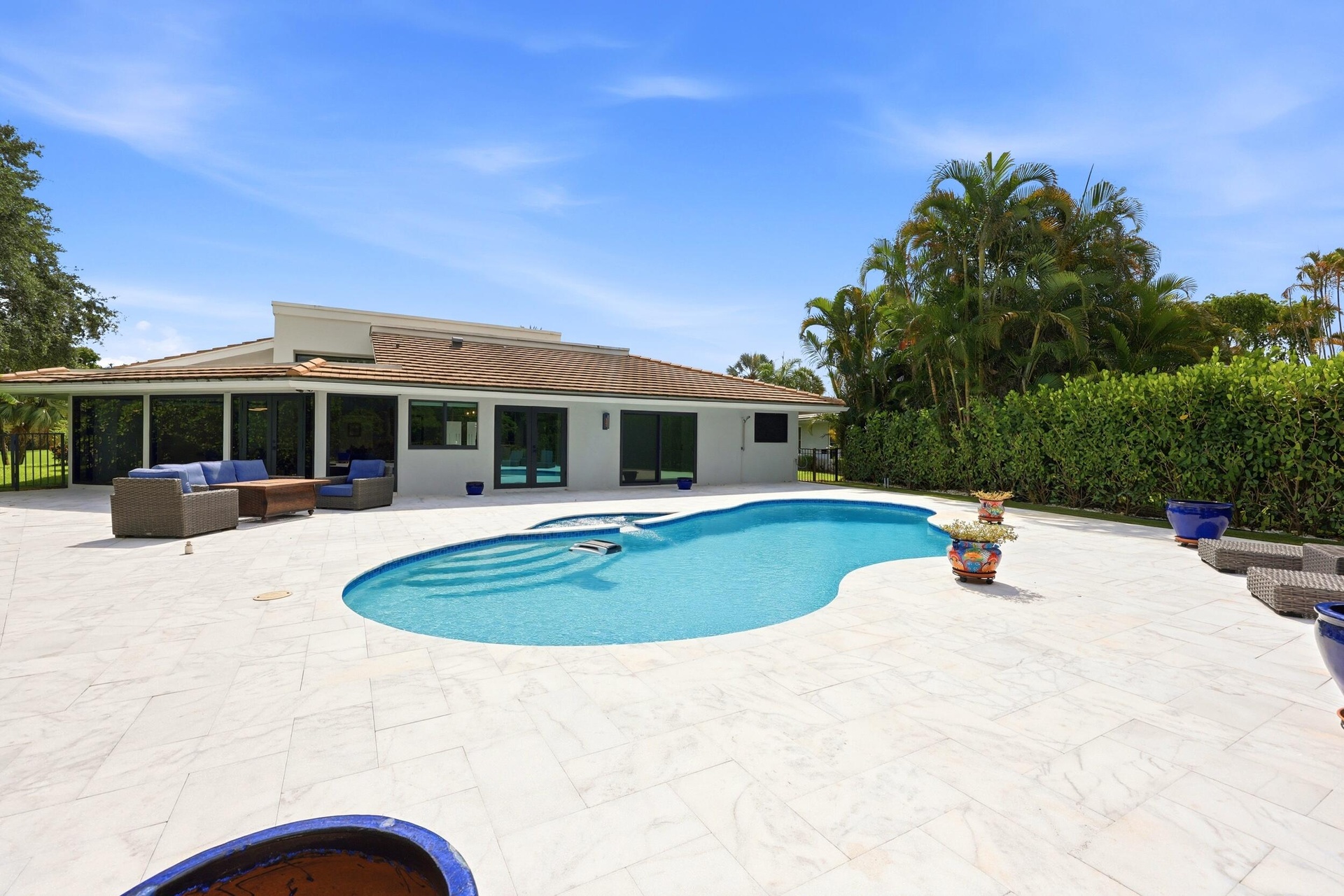 Discover your own private backyard sanctuary where modern luxury meets the natural beauty of Old Florida. Backing directly to a nature preserve, this 
