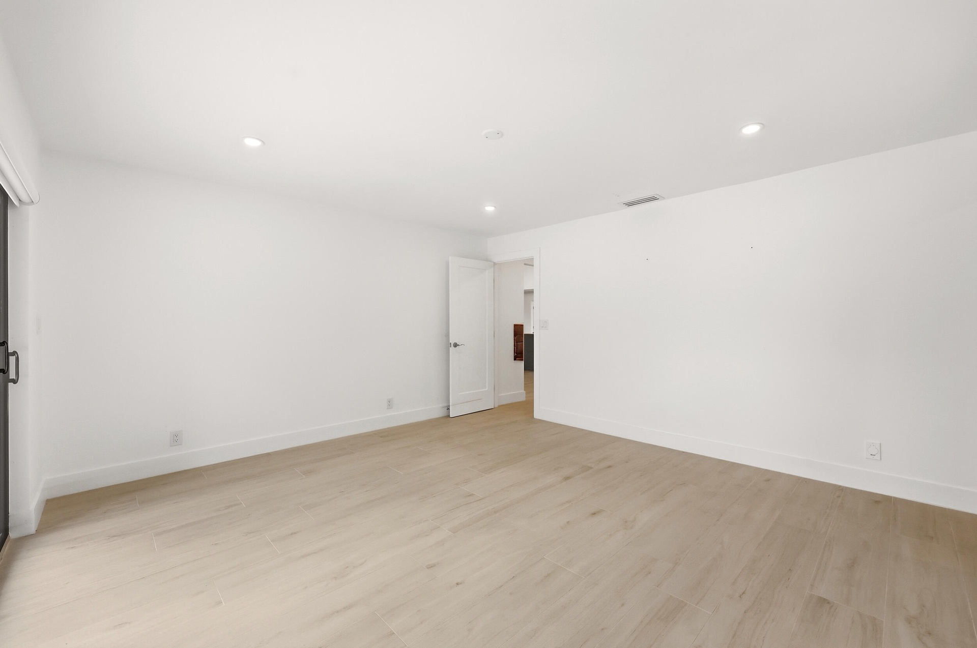 Designed as a true private guest retreat, this spacious suite offers exceptional comfort, privacy, and direct access to the backyard through oversized