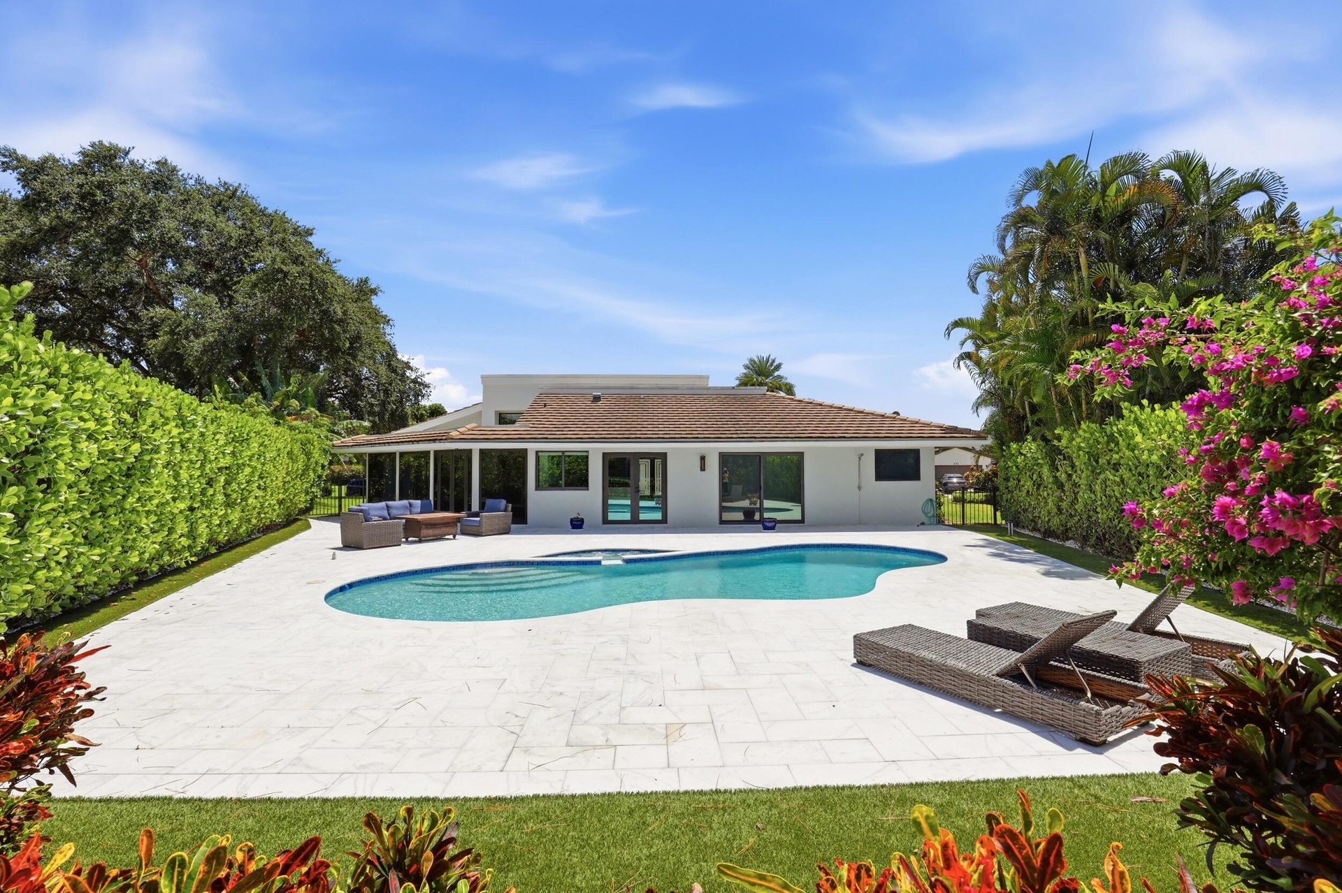 Discover your own private backyard sanctuary where modern luxury meets the natural beauty of Old Florida. Backing directly to a nature preserve, this 