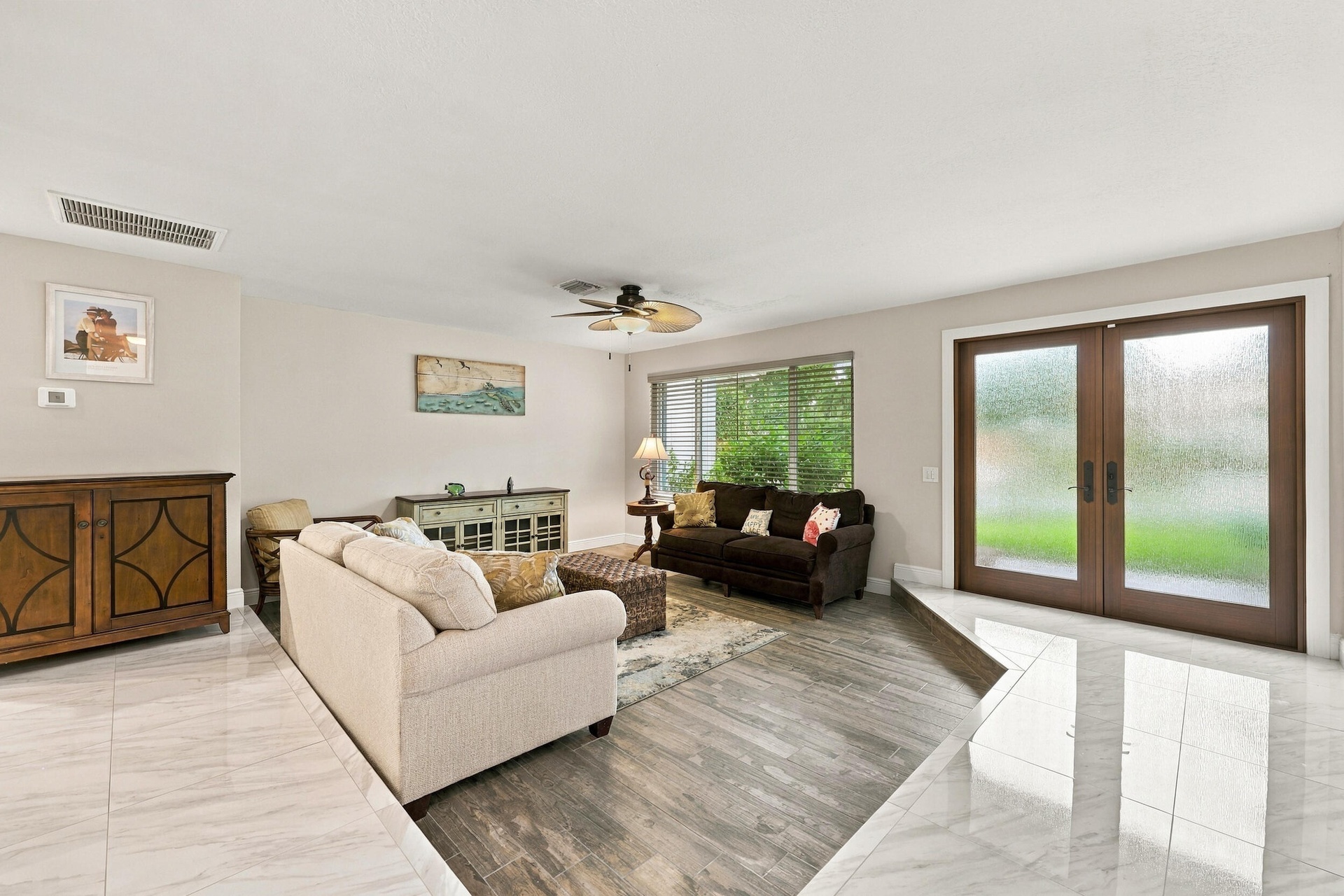 A spacious and versatile floor plan offers a formal living area that flows nicely into the updated kitchen and then into a family or bonus room. Every