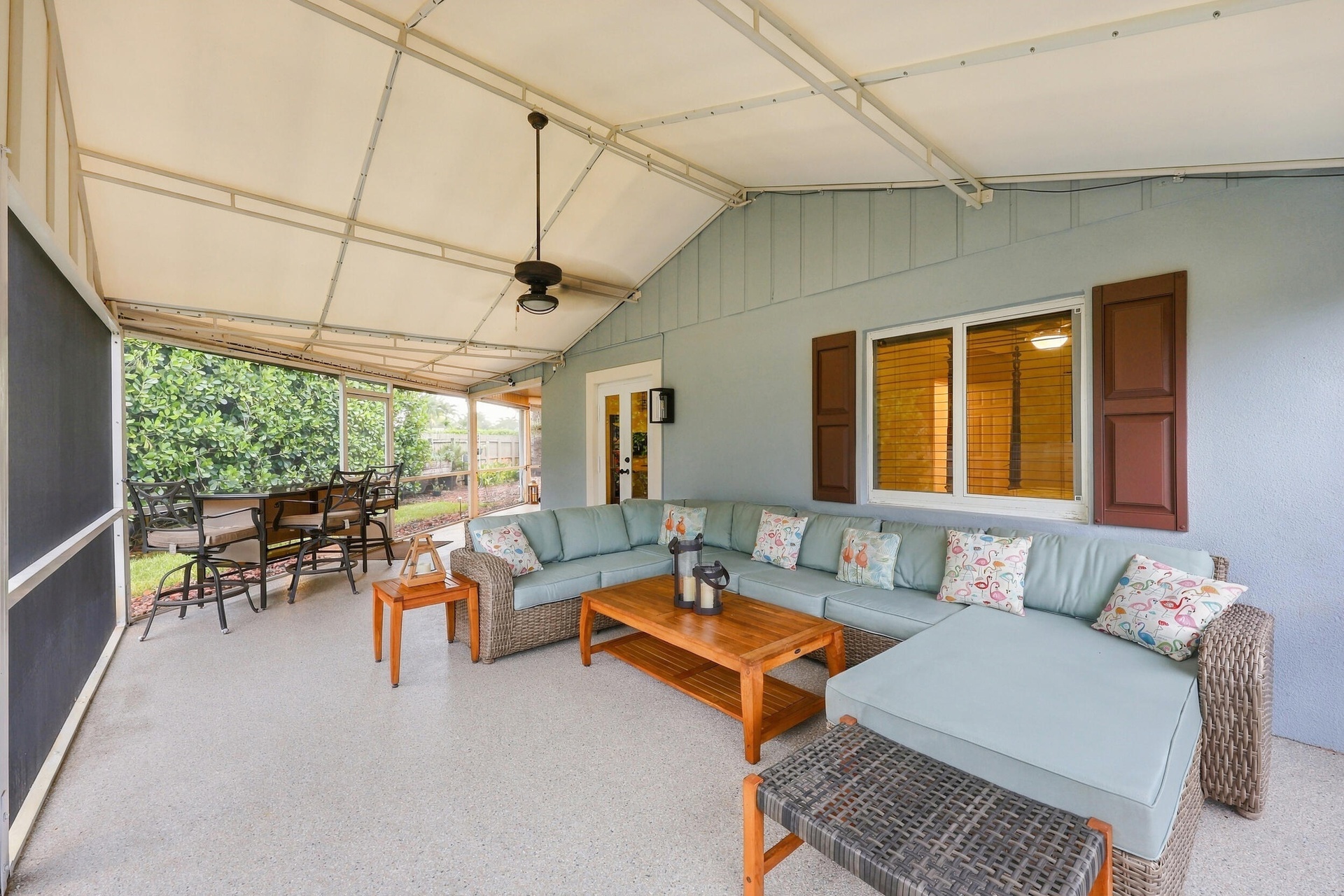 Live the epitome of the South Florida lifestyle with this 1,360 sq. ft. patio. It offers a built-in bar with quartz countertops, a grill area with hoo