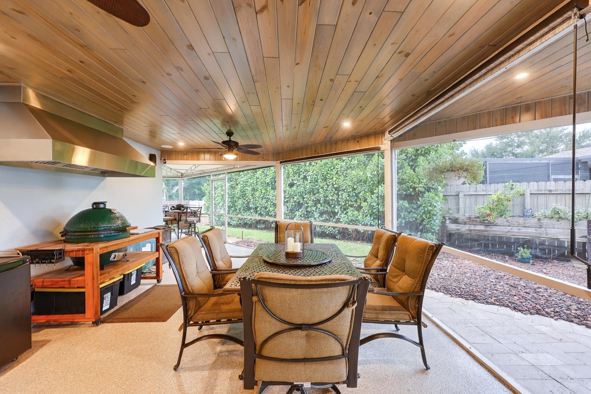 Live the epitome of the South Florida lifestyle with this 1,360 sq. ft. patio. It offers a built-in bar with quartz countertops, a grill area with hoo