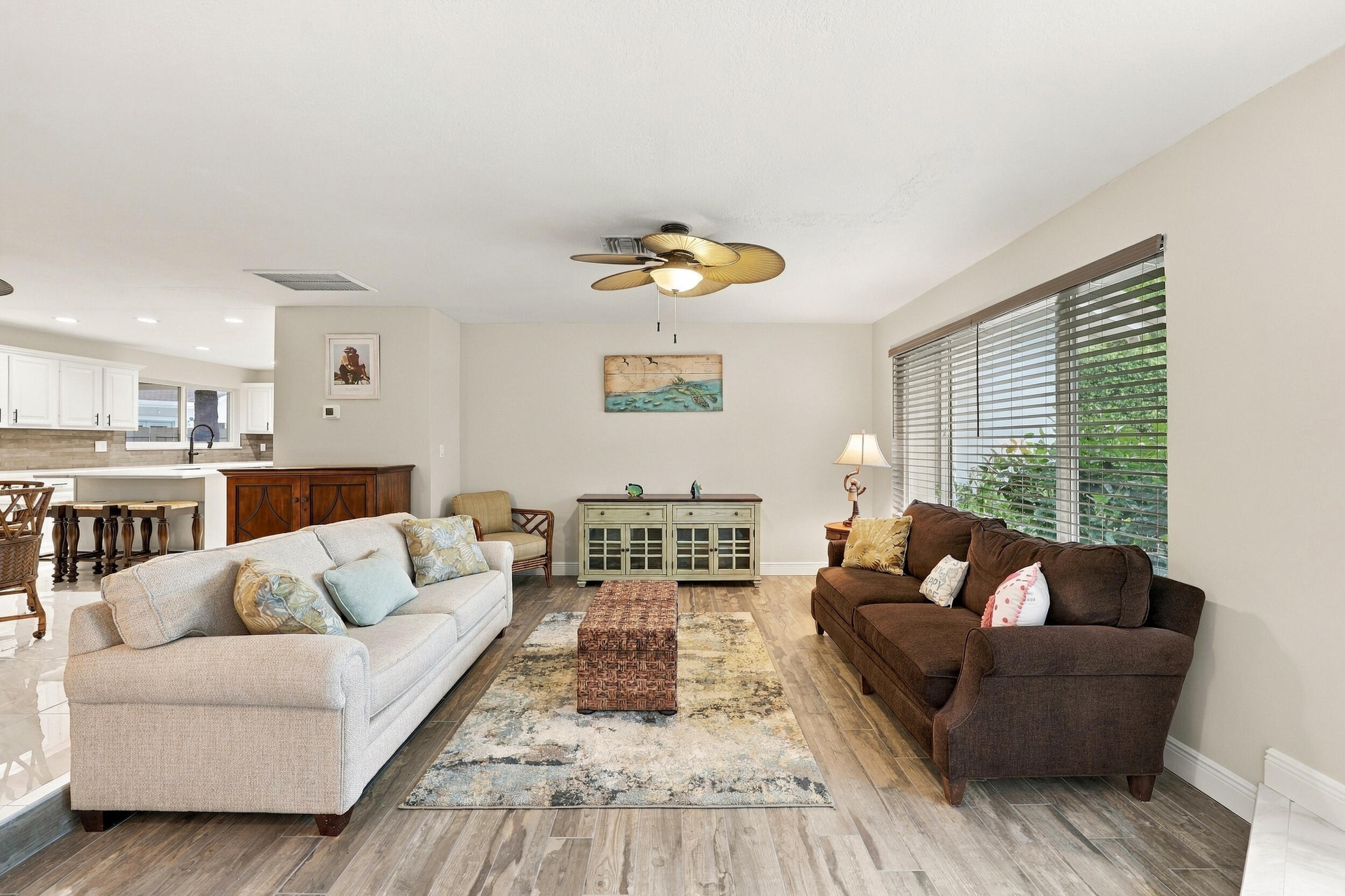 A spacious and versatile floor plan offers a formal living area that flows nicely into the updated kitchen and then into a family or bonus room. Every