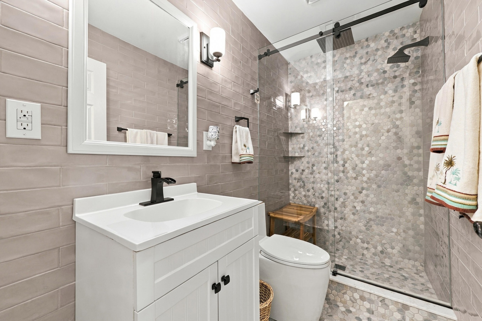 Bathroom 1 services all three of the guest bedrooms.