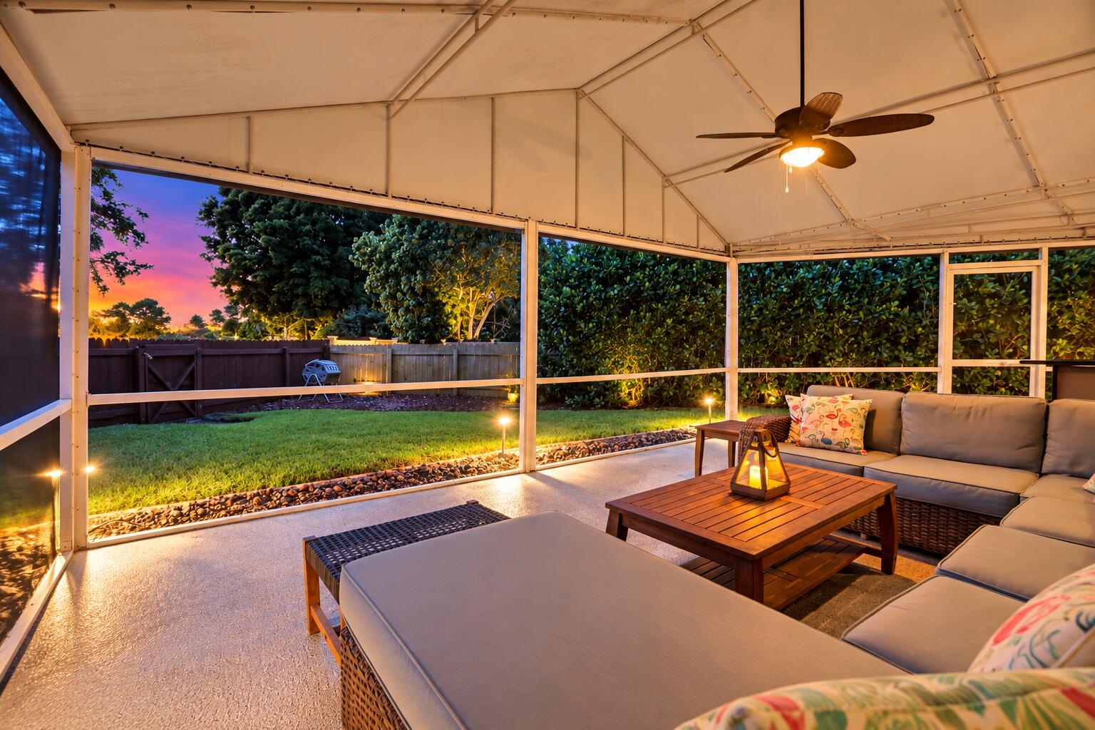 Live the epitome of the South Florida lifestyle with this 1,360 sq. ft. patio. It offers a built-in bar with quartz countertops, a grill area with hoo