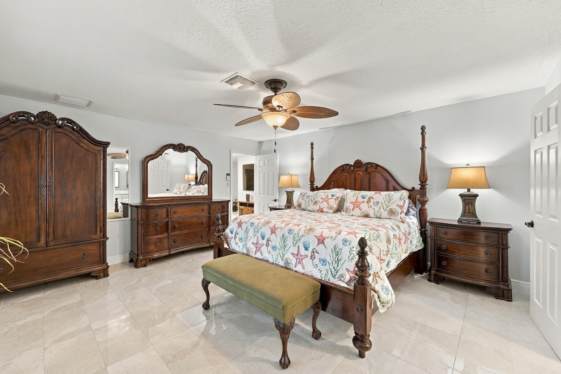 The primary suite has everything you have been looking for: spacious and elegant, with a walk-in closet, a fully updated en-suite bathroom, and lots o
