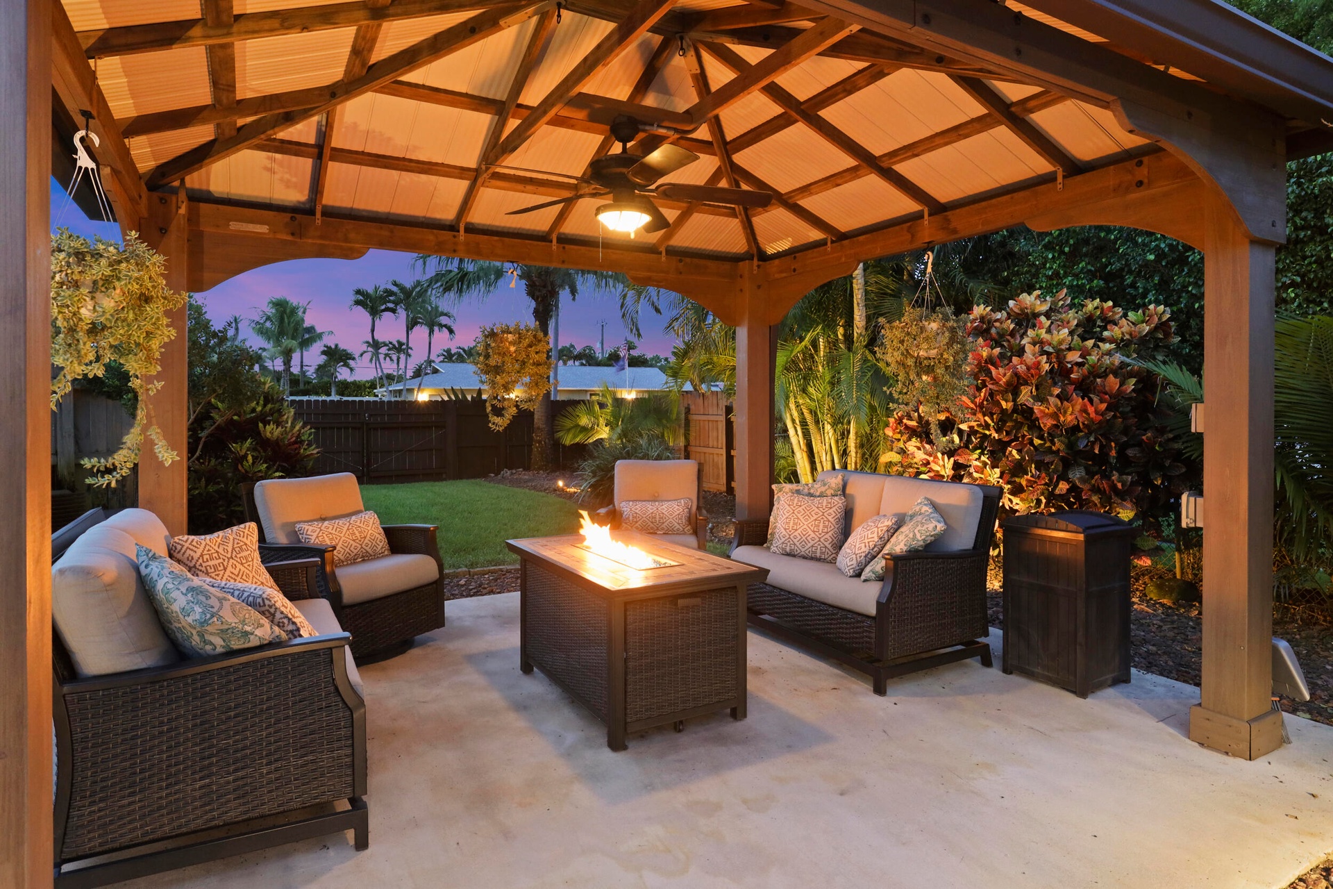 A built-in gazebo with electric offers a private, cozy space to relax and unwind. Beyond the pool is a space big enough to fit an RV, boat, golf simul