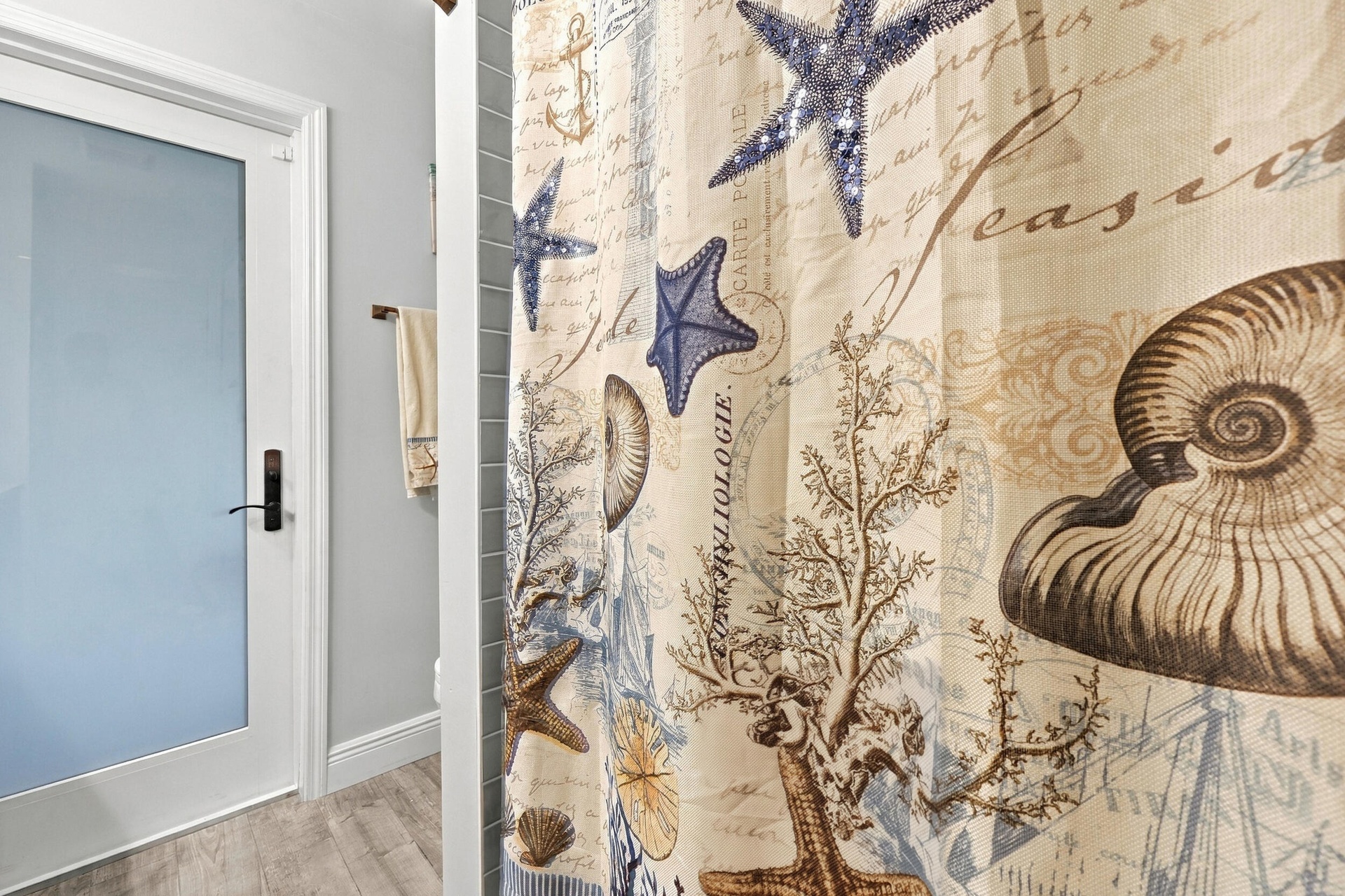 Bathroom 3 is a fully updated cabana bathroom with a new vanity, countertops, tile, and a tub and shower. Your guests will access it while spending da