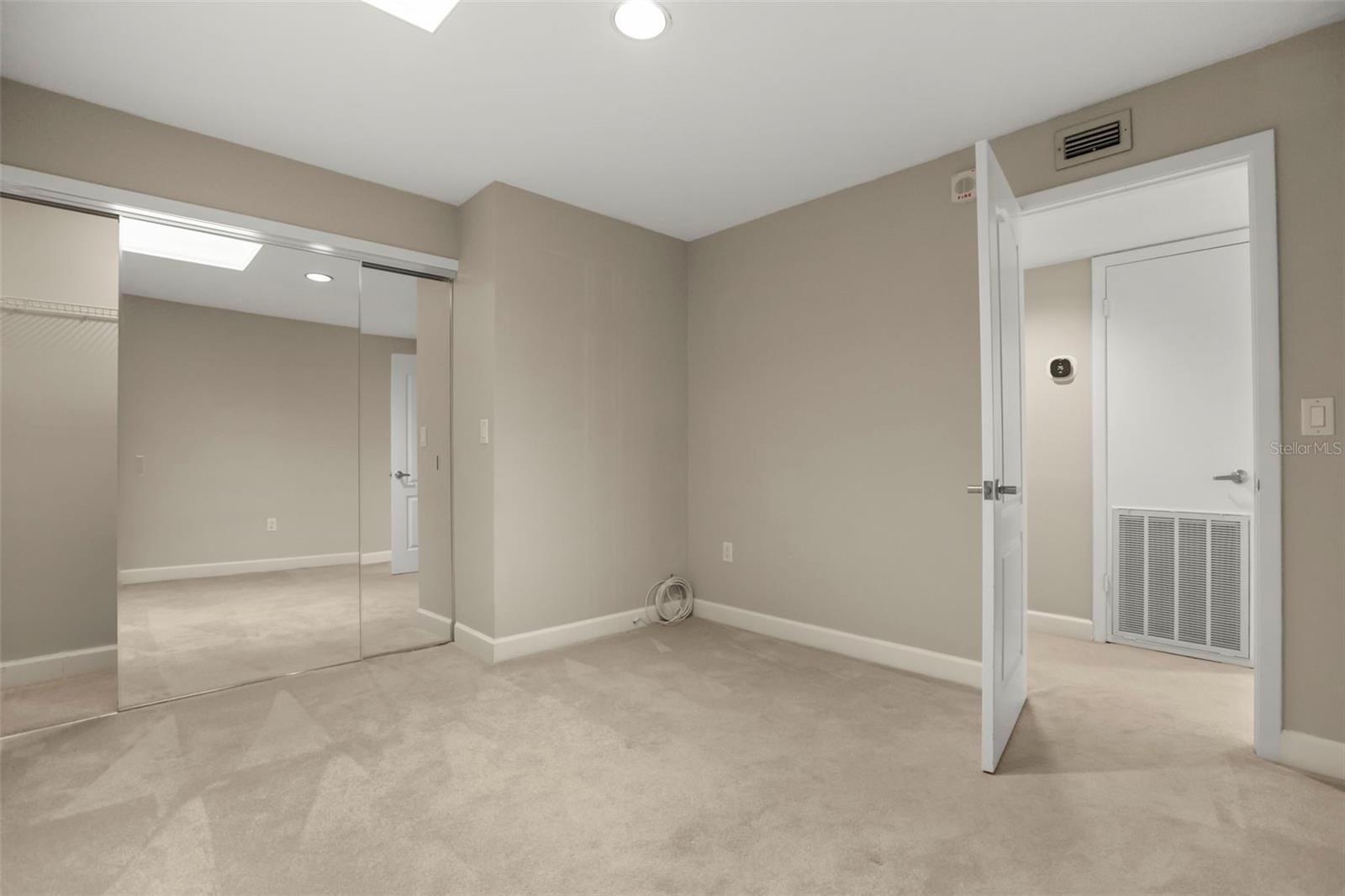 Bedroom 3 includes a skylight, another luxury of the top floor condo!
