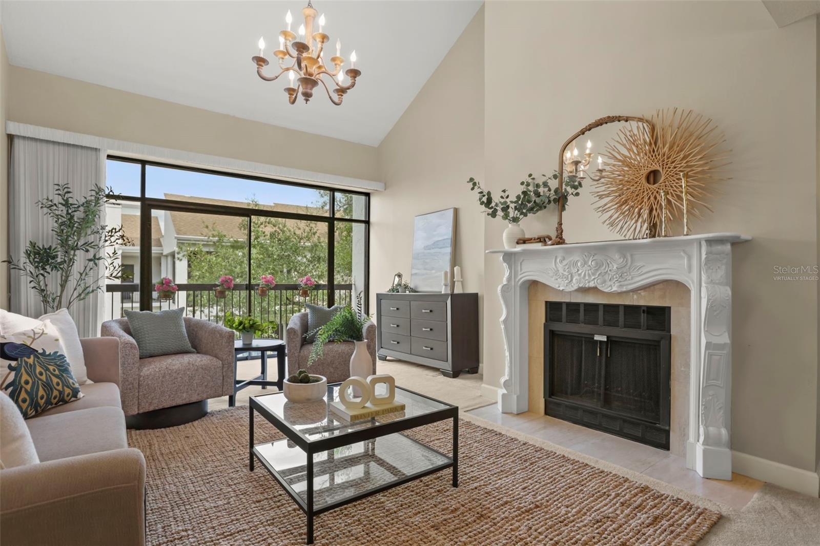 Vaulted ceilings, a wood-burning fireplace, and expansive windows give a hint of how remarkable this condo is.