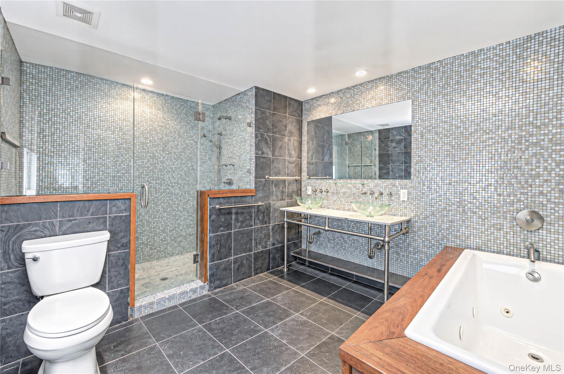 Spa like bath with double sinks, walk in shower
