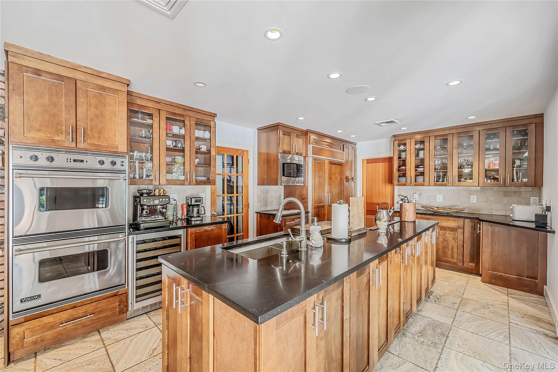 Chef's Delight! Custom Kitchen with Viking & SubZero appliances, beverage refrigerator