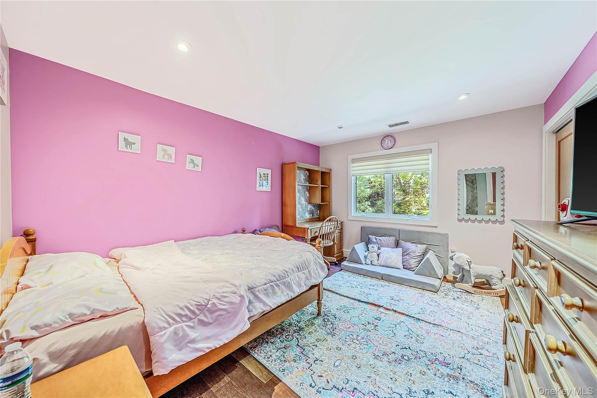 Bedroom 2 - large closet, wood floors, recessed lighting