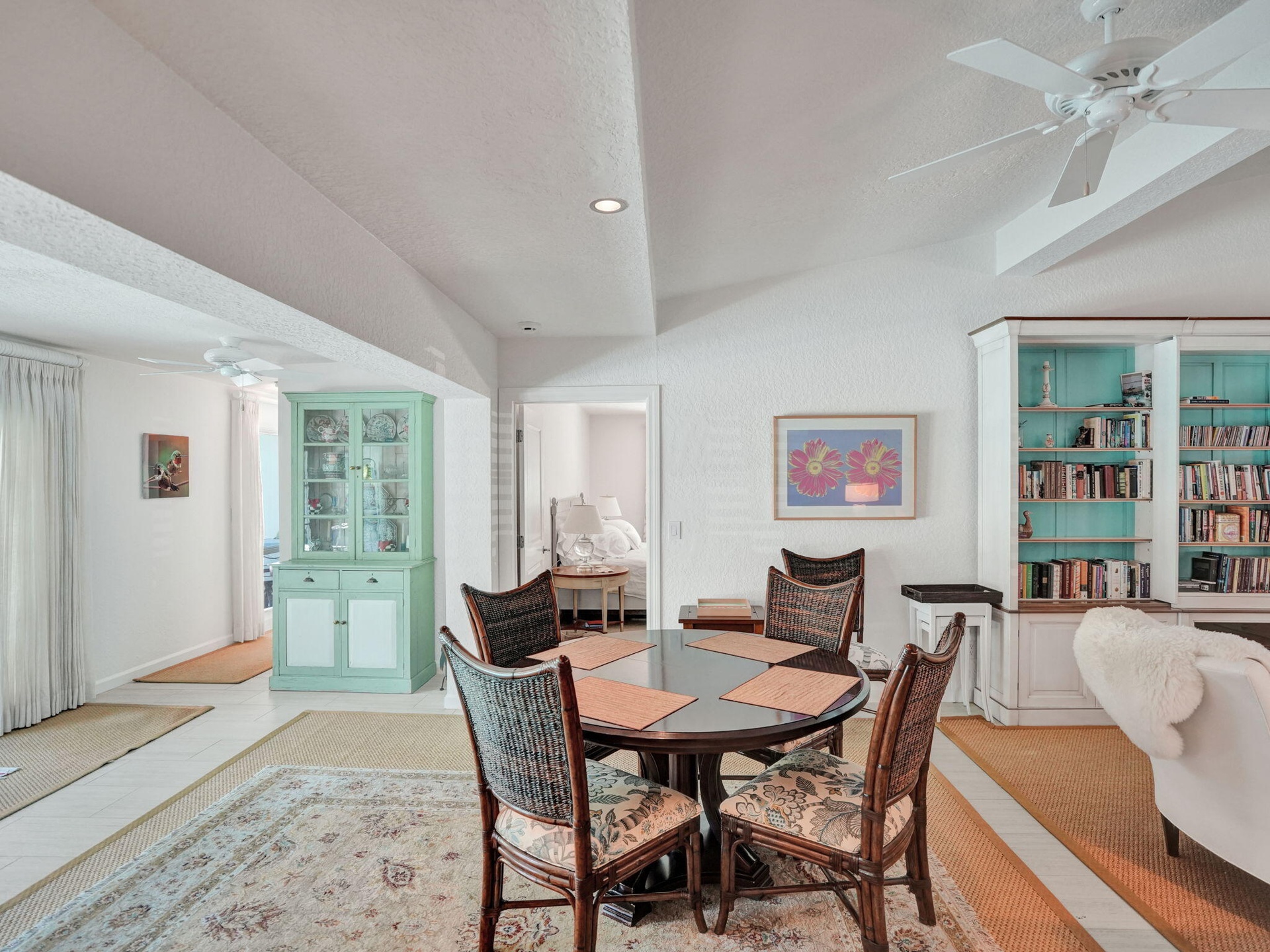 Dining area flows seamlessly from the living area and wet bar.