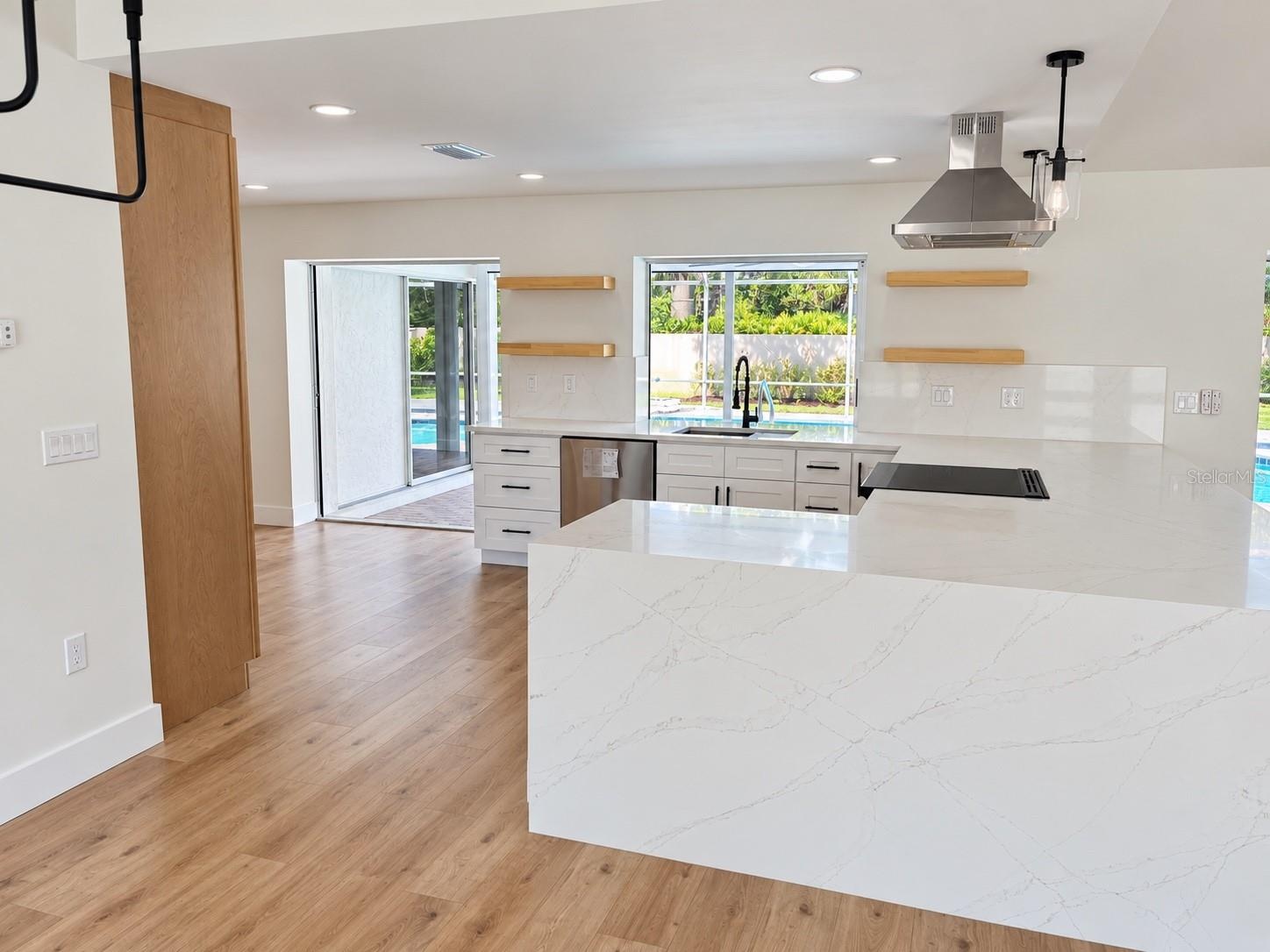 Kitchen with illuminated shelving