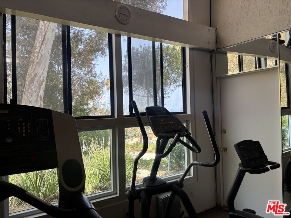 Fitness center with view of Oc