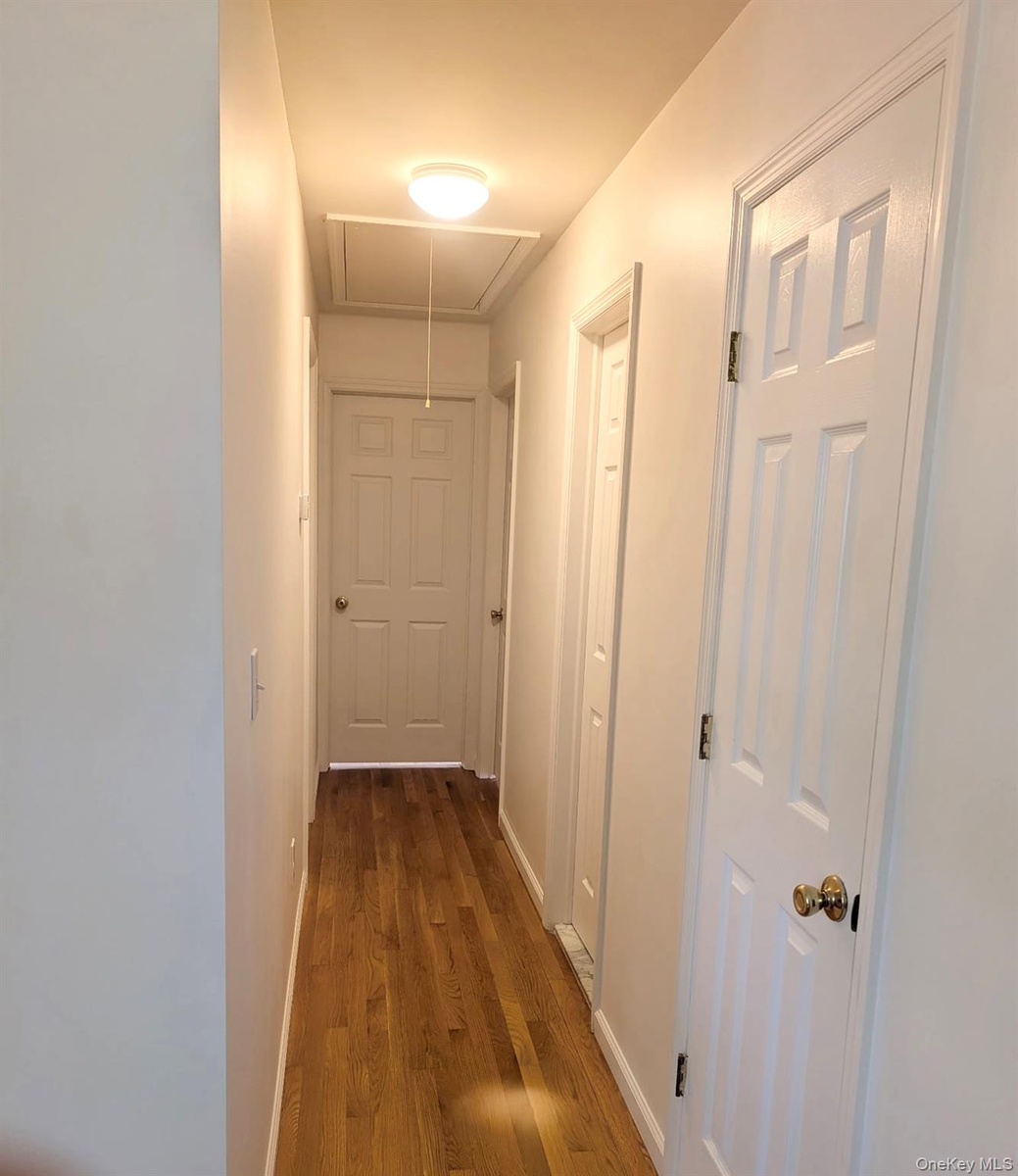 Pull down stairs provide easy access to additional space.