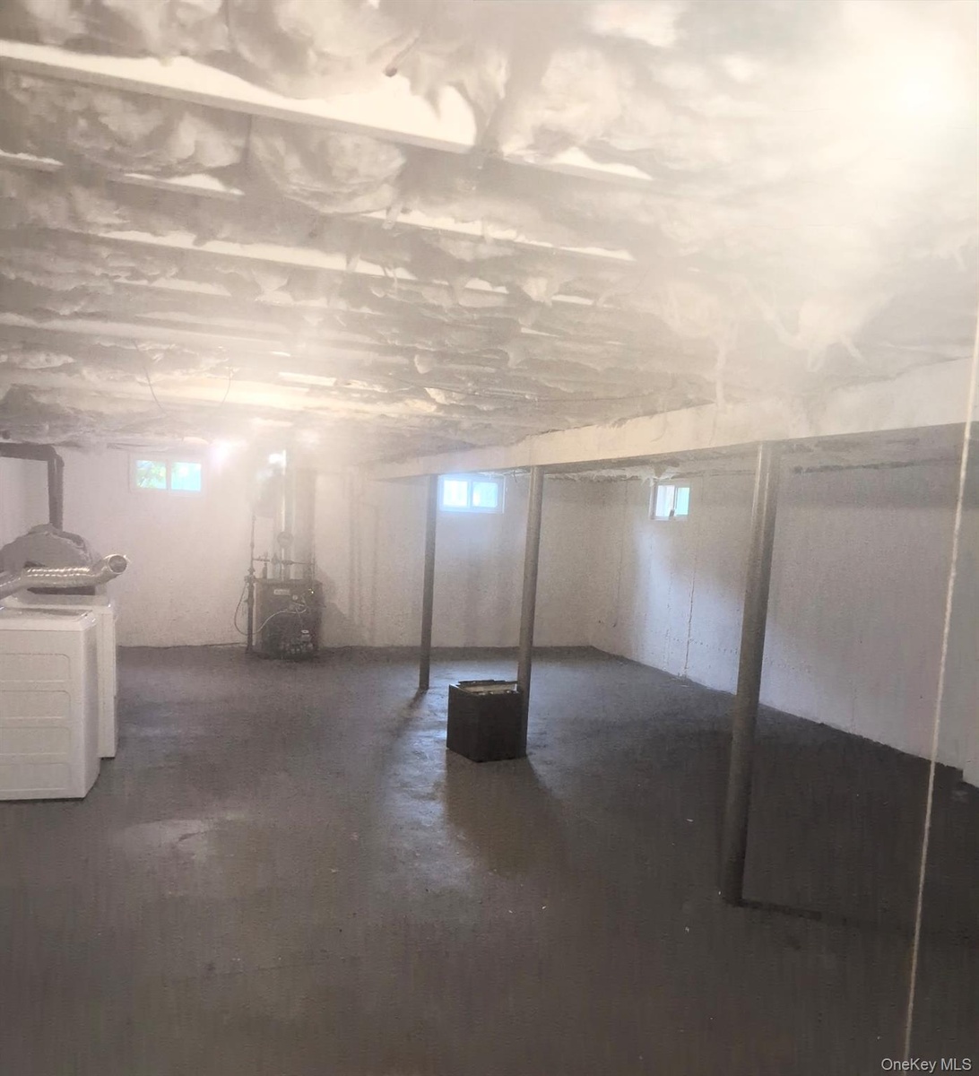 ...washer, dryer, oil tank and utilities with insulated ceilings and newer basement windows.