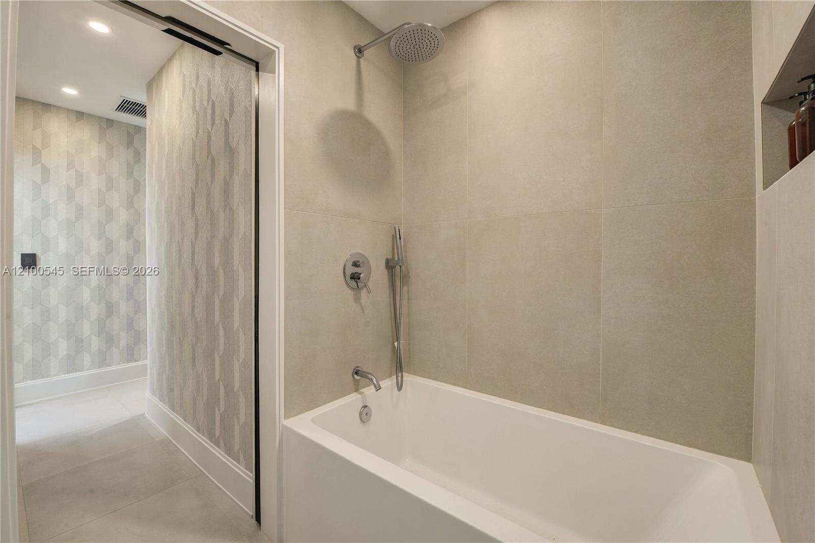 Calming Shared Bathroom with deep bathtub