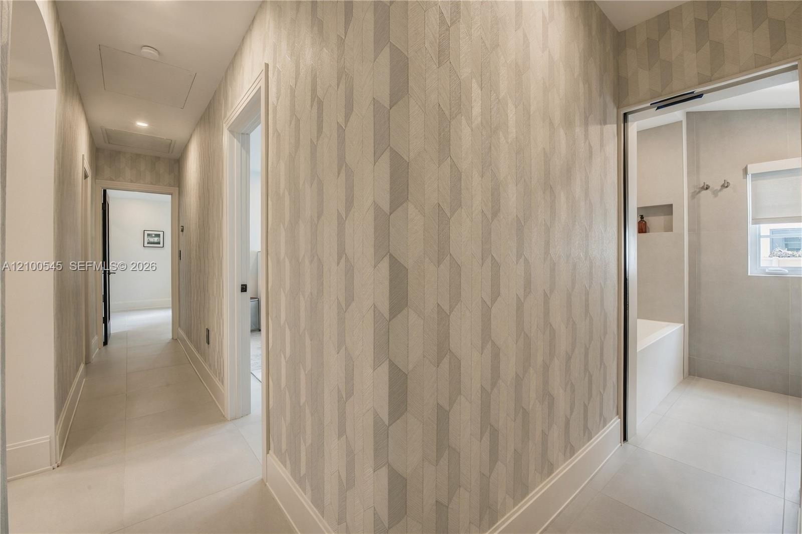 Wallpapered Hallway for separate sleeping wing of residence.