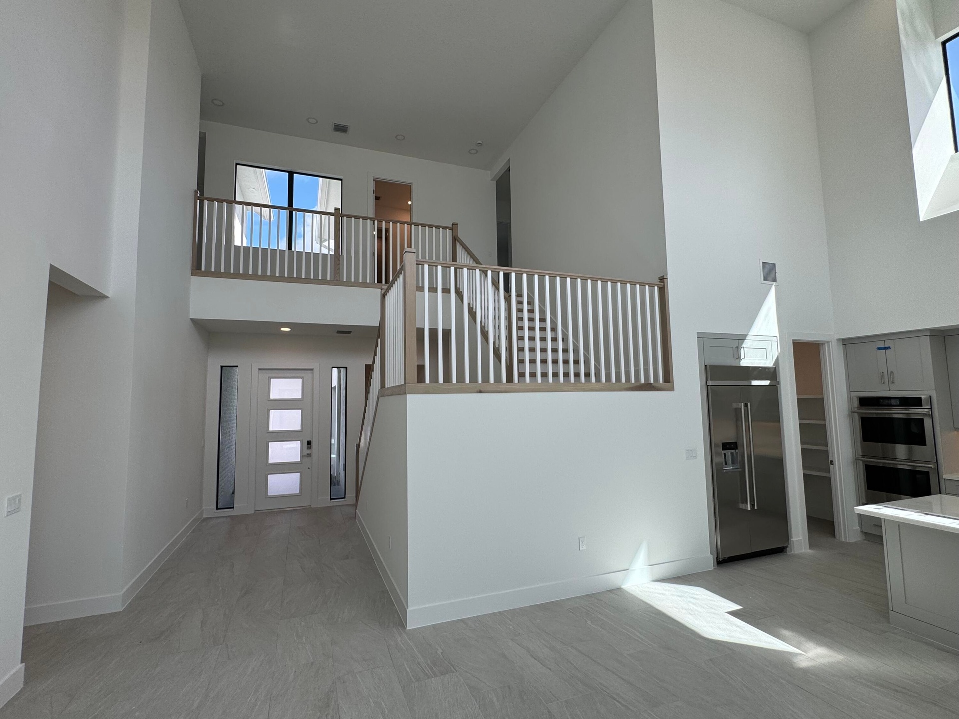 Great Room Looking Onto The Foyer (Pictures Are Not Of Actual Home)