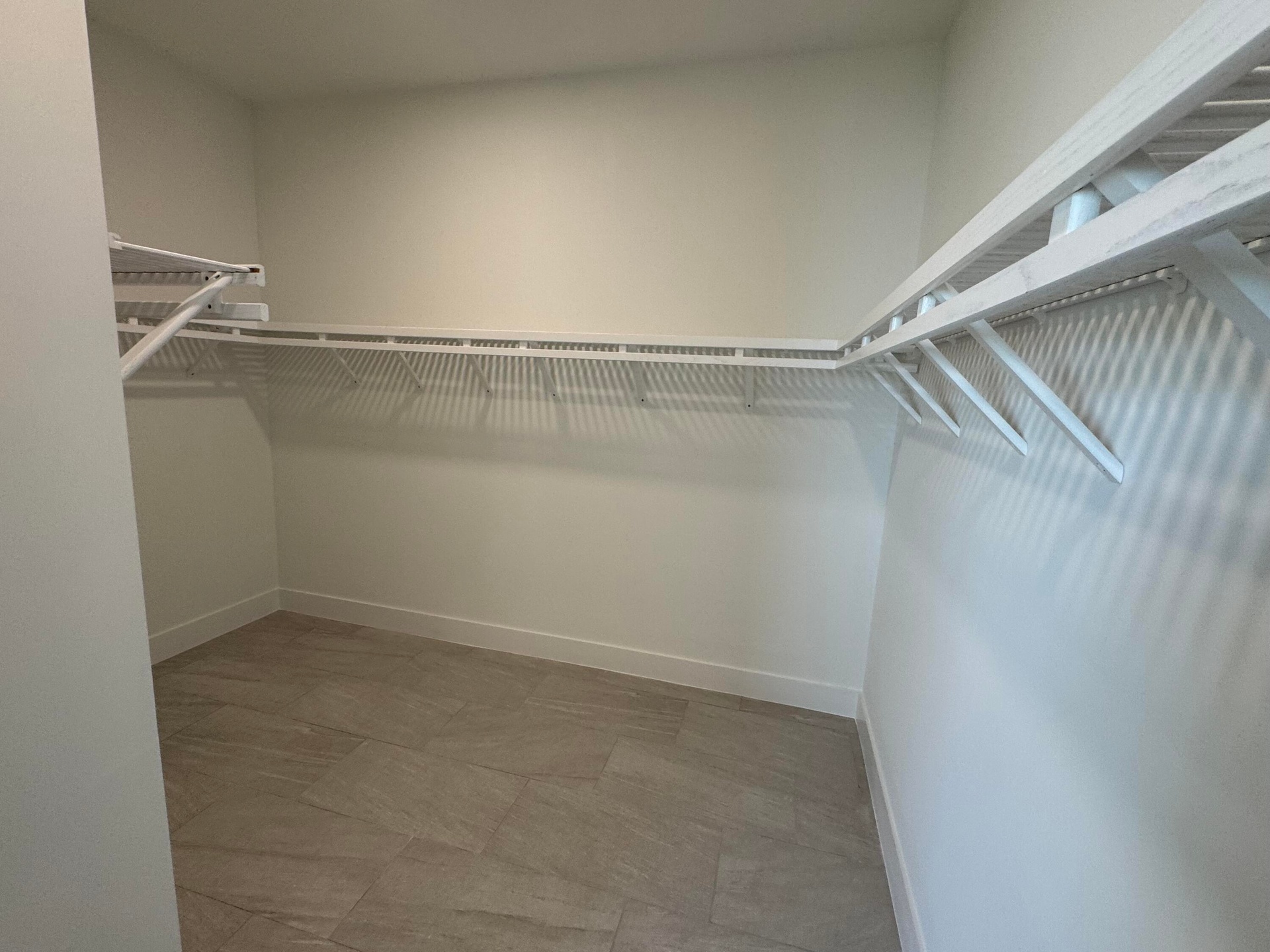 Primary Walk In Closet (Pictures Are Not Of Actual Home)