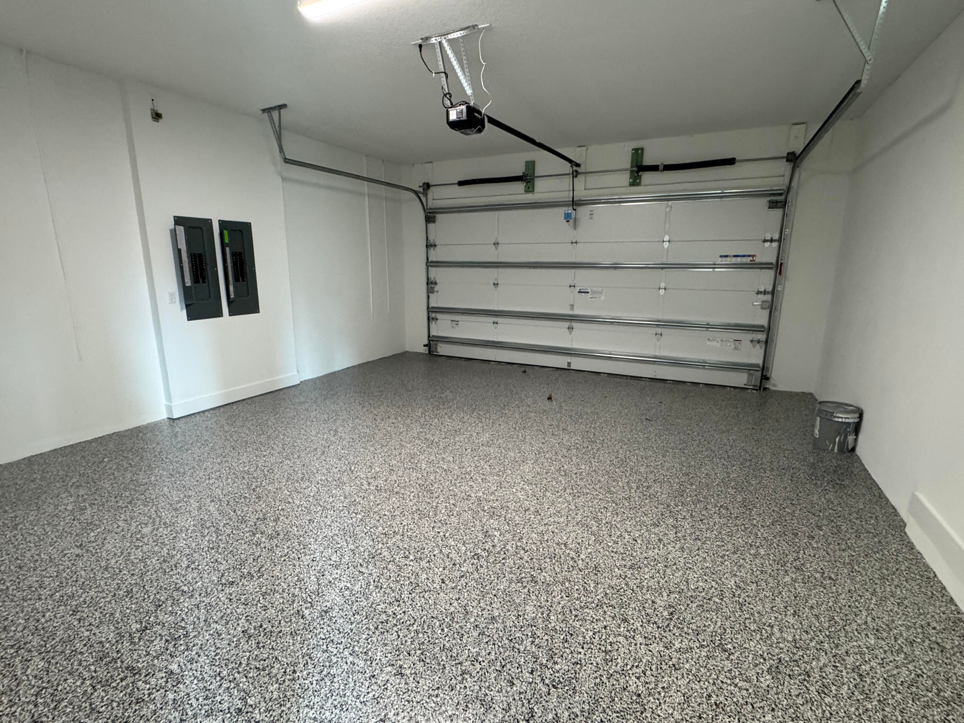 Garage With Epoxy Floor And Tankless Hot Water Heater (Pictures Are Not Of Actual Home)
