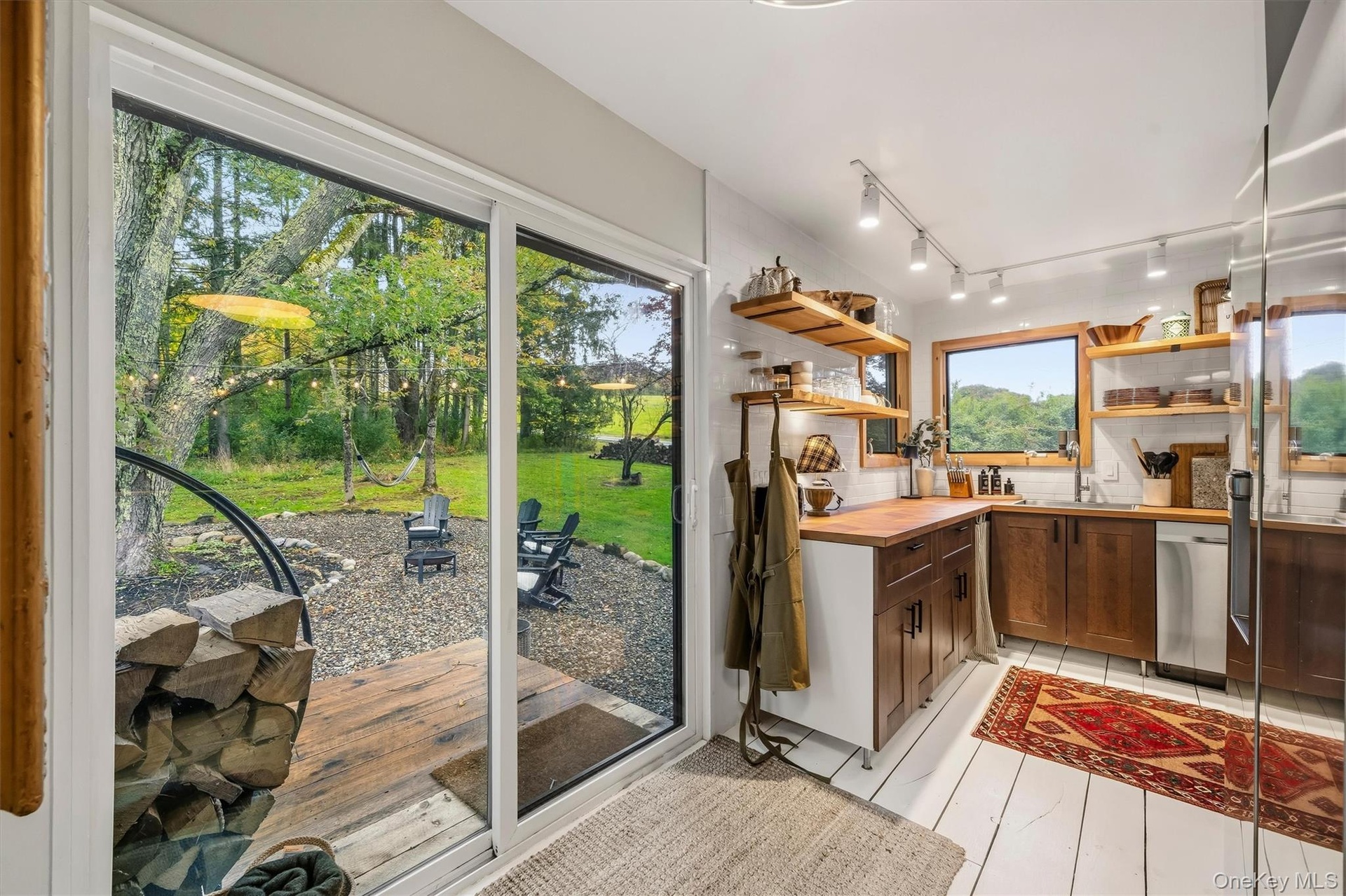 sliders to backdeck and yard with firepit