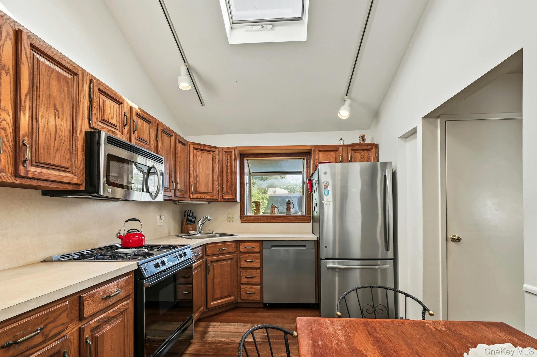 Bright eat-in kitchen with skylight