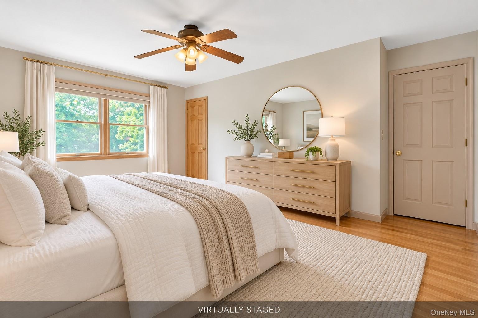 Virtually Staged Primary Bedroom With En-suite Bath and Walk-In Closet