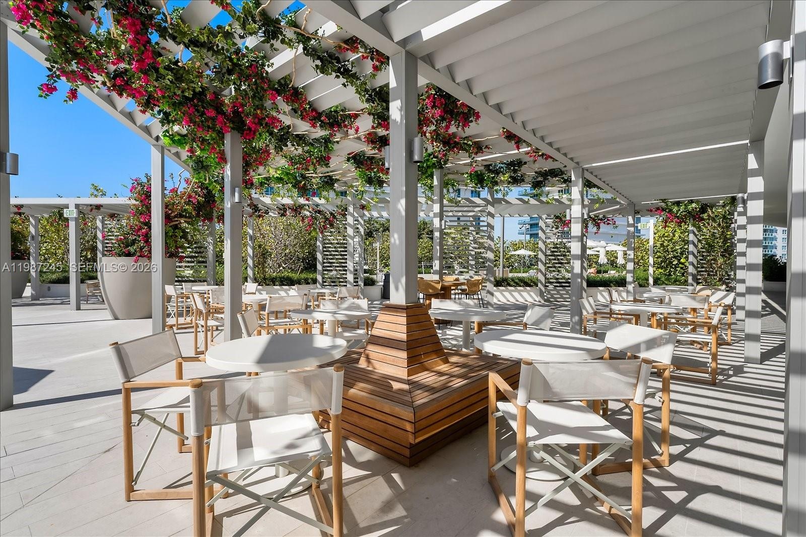 Outdoor Dining on the pool deck curated by James Beard Award-winning Chef Michelle Bernstein at the Full-Service Five Park Miami Beach.