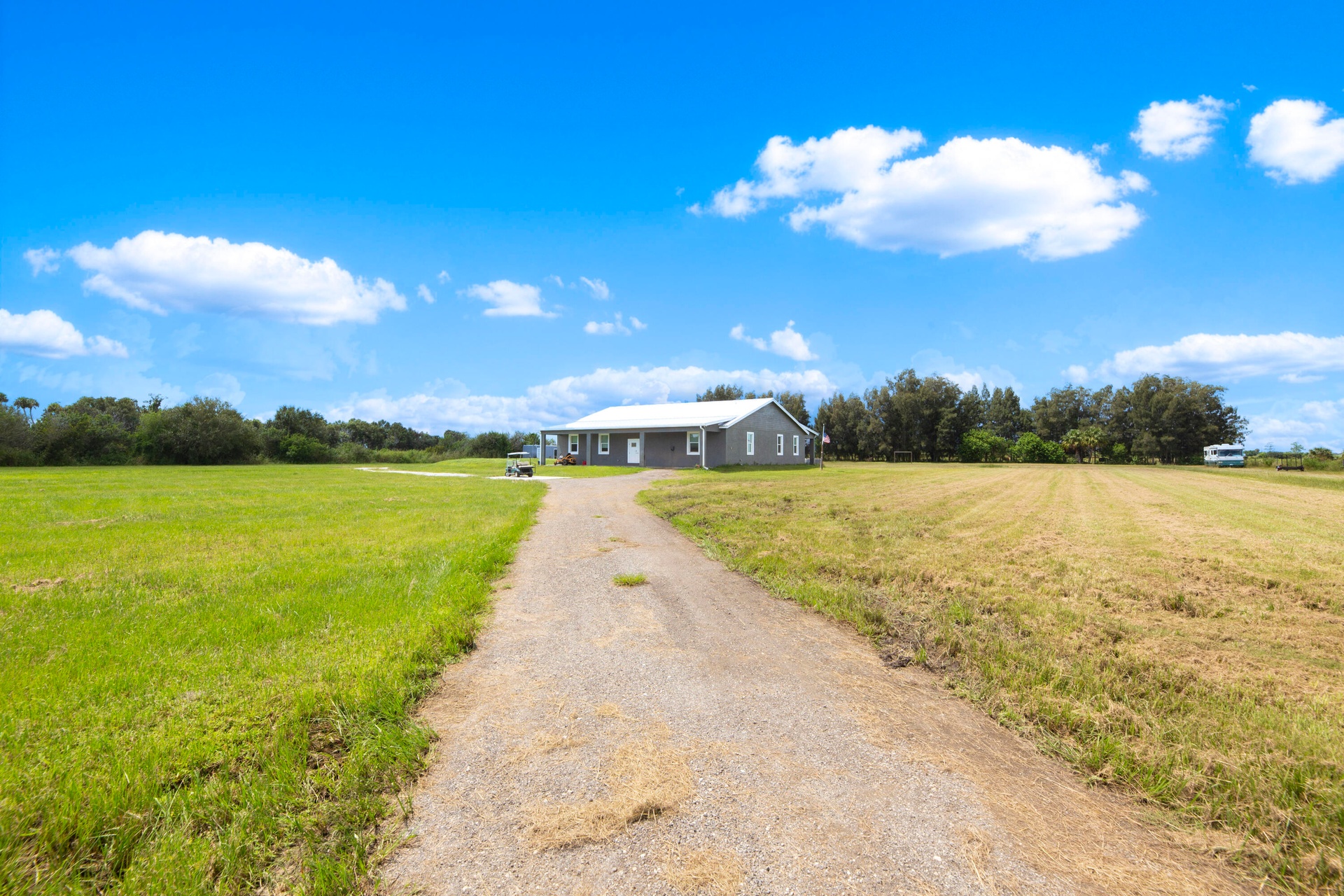 Long private driveway leading to the home