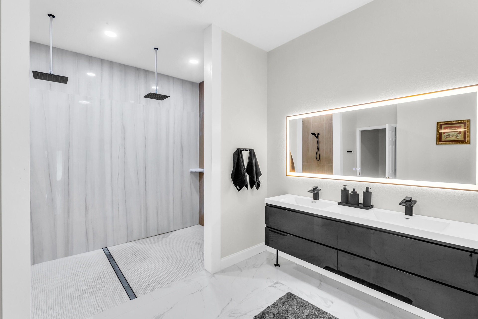 Primary bath with double vanity and oversized walk-in shower