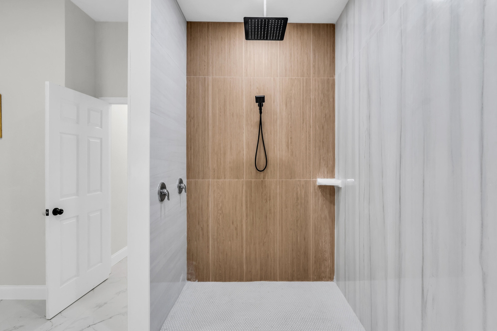 Spa-style walk-in shower with rain showerhead