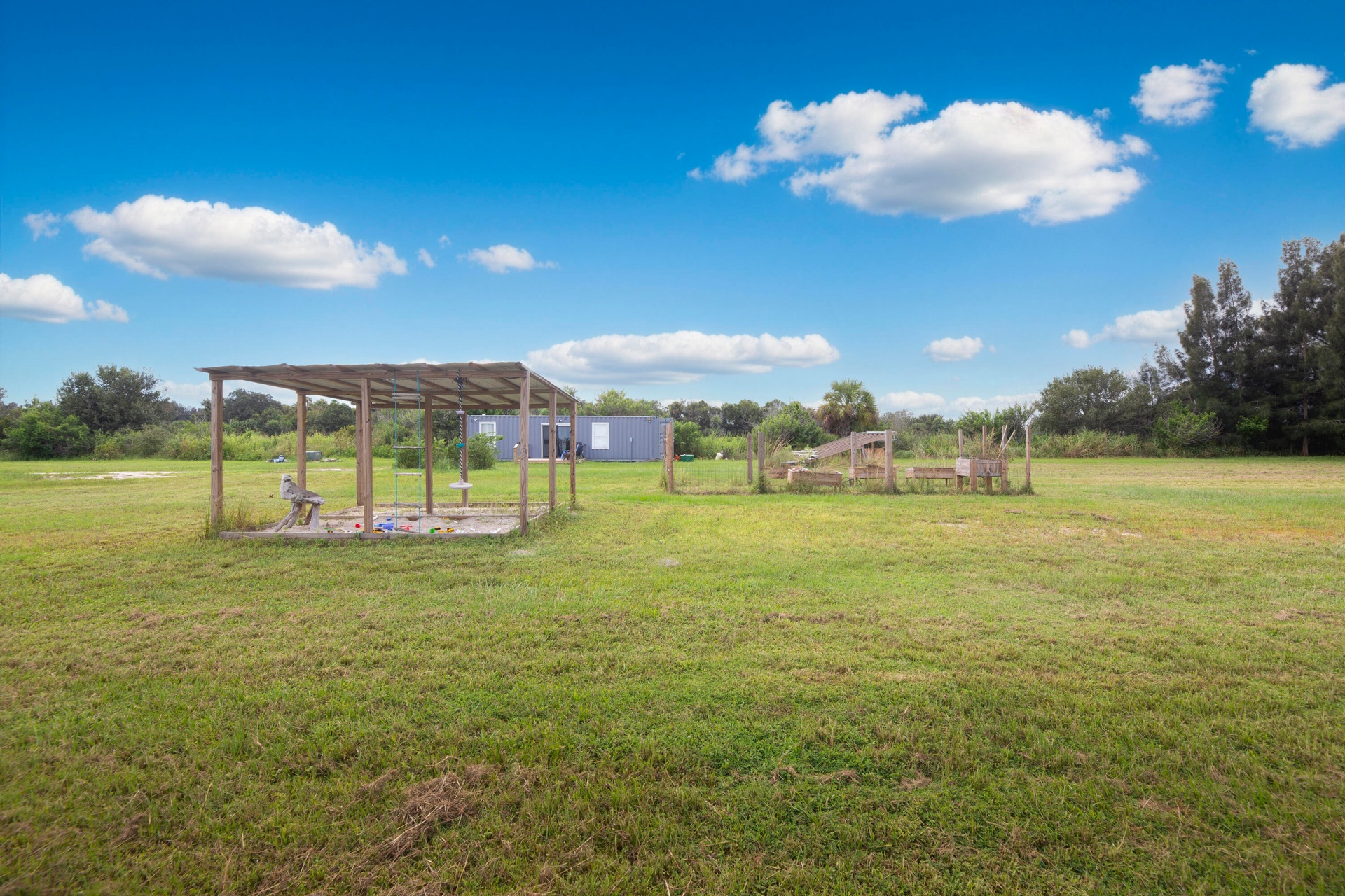 Open-sided shade structure on the property