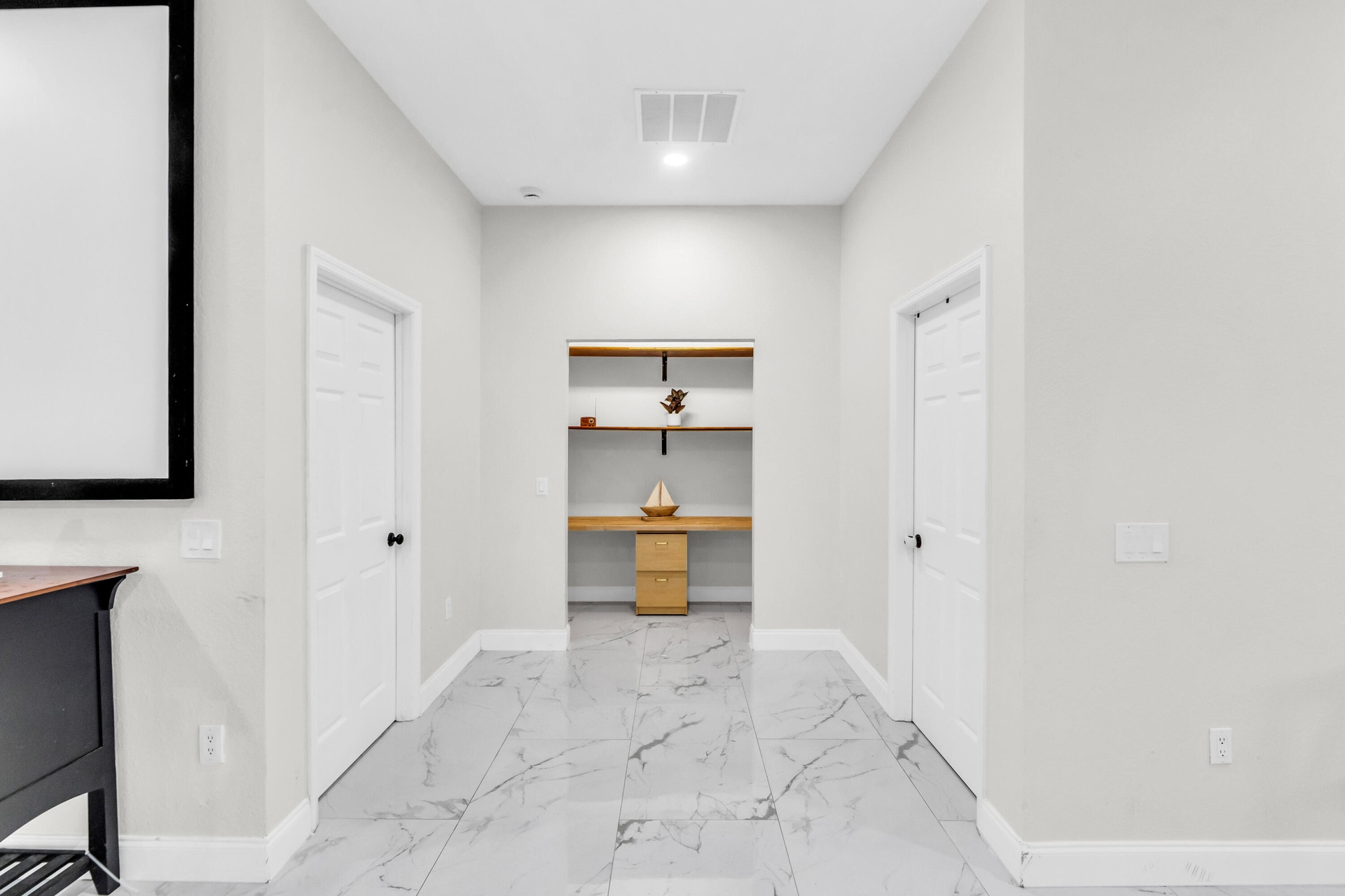 Hallway with built-in desk nook