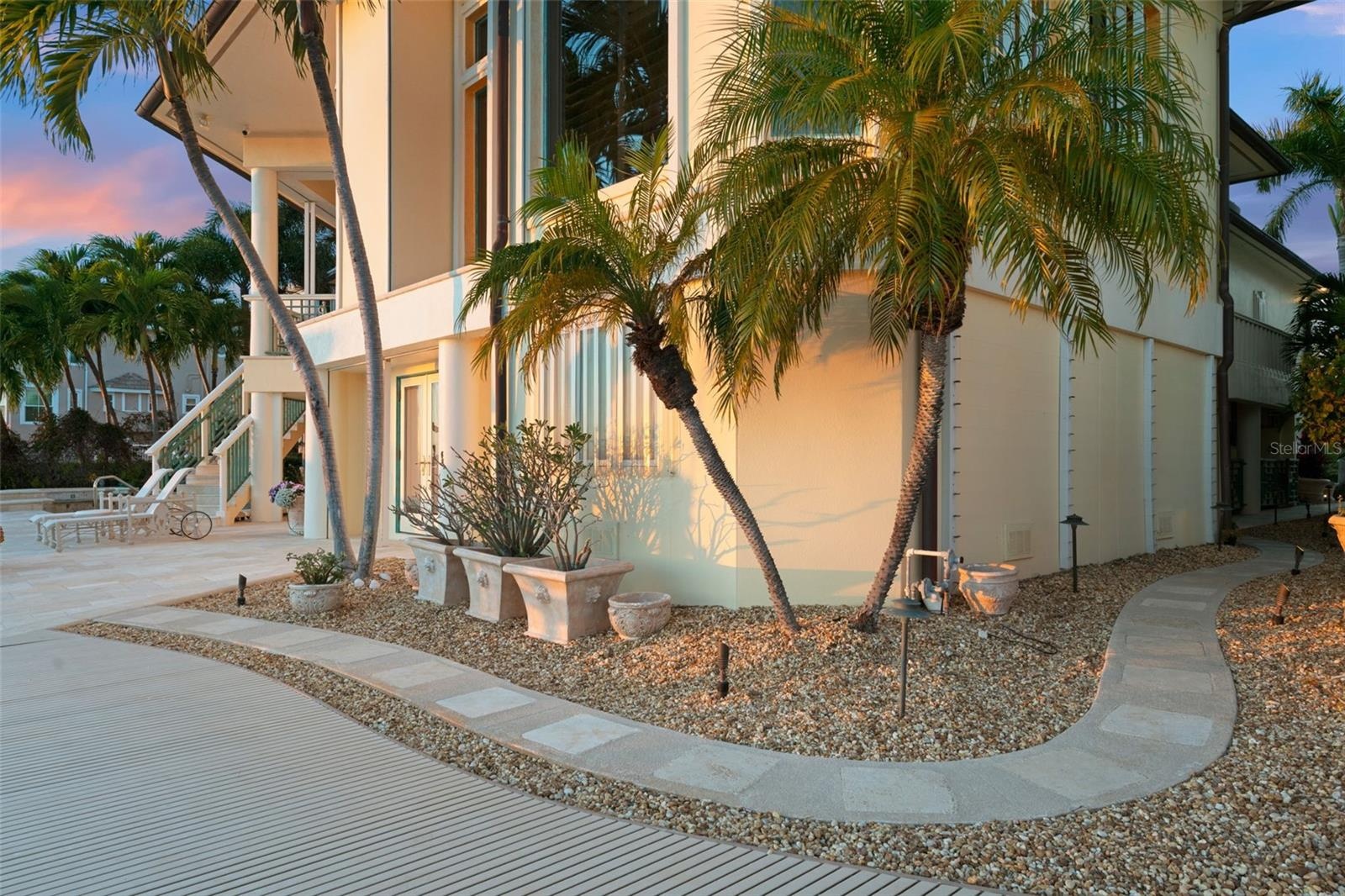 Sidewalk to the Pool Equipment and to the Gate to the front yard.