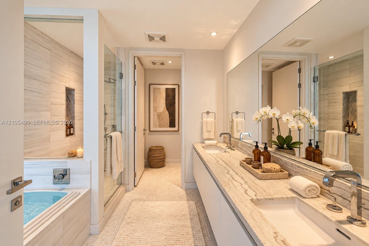 Dual-sink vanity with stone countertop, oversized wall-to-wall mirror, glass-enclosed shower, soaking tub with tile surround, and recessed wall niche