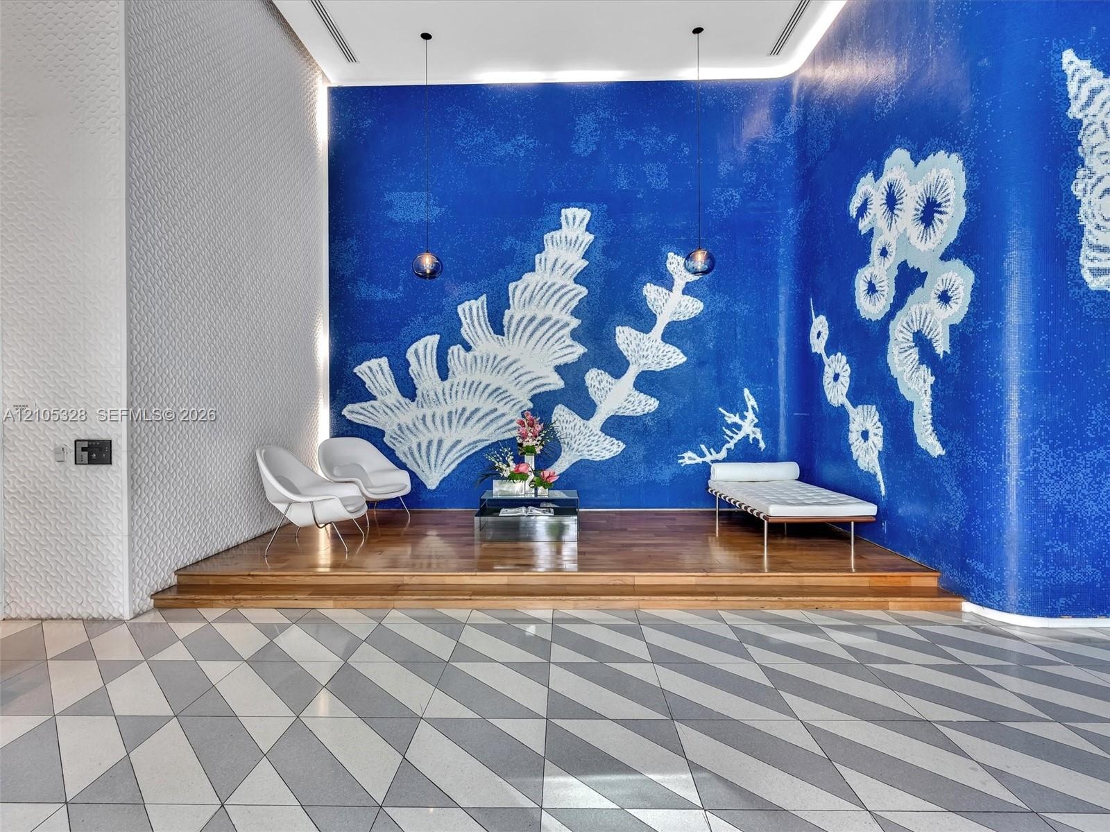 Step into an elegant, contemporary lobby with the intimate ambiance of a luxury boutique hotel, featuring distinctive designer finishes, stylish archi