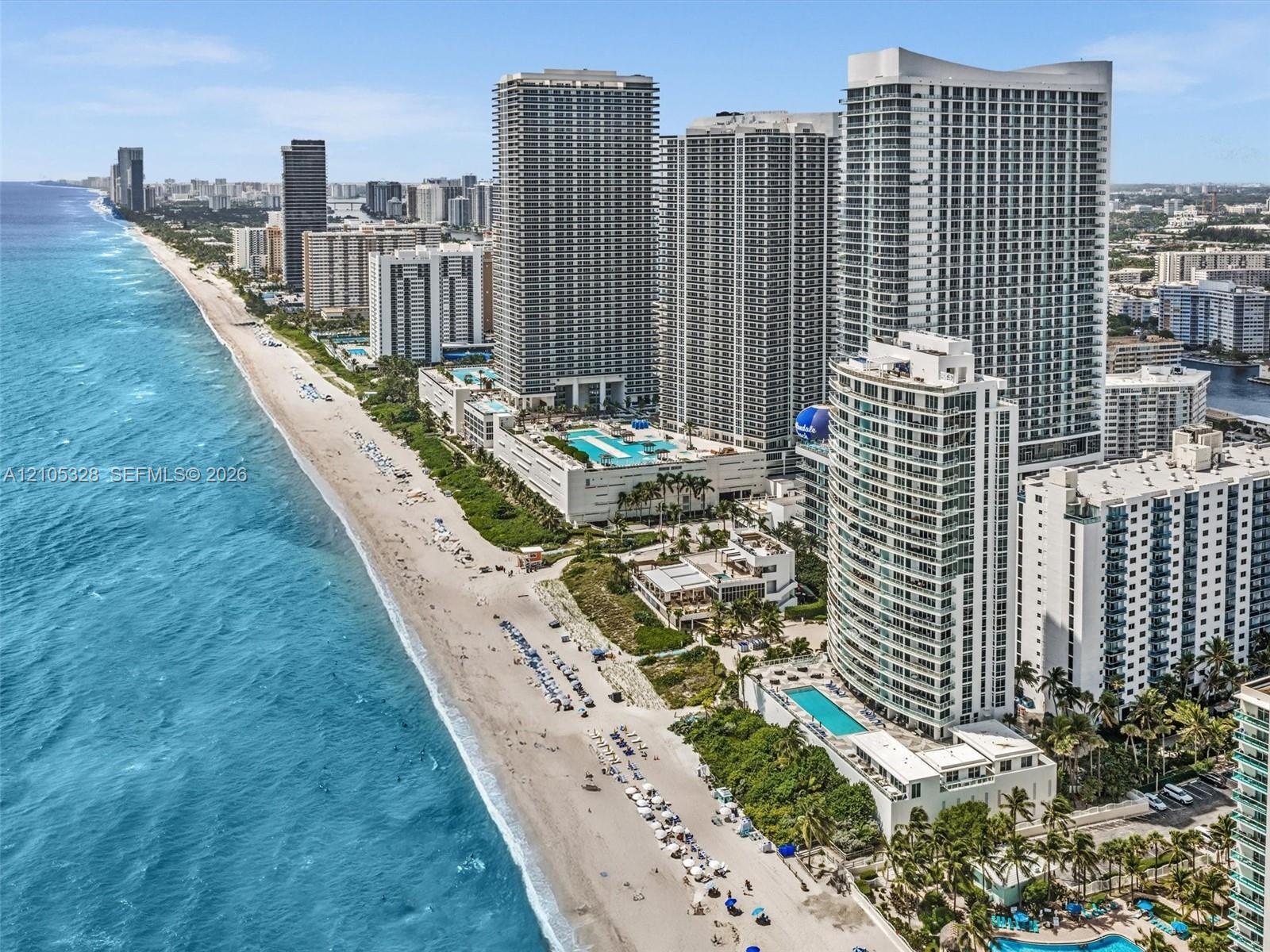 Experience luxury oceanfront living at Apogee Beach, featuring direct beach access, resort-style pools, and amenities, and exceptional coastal lifesty