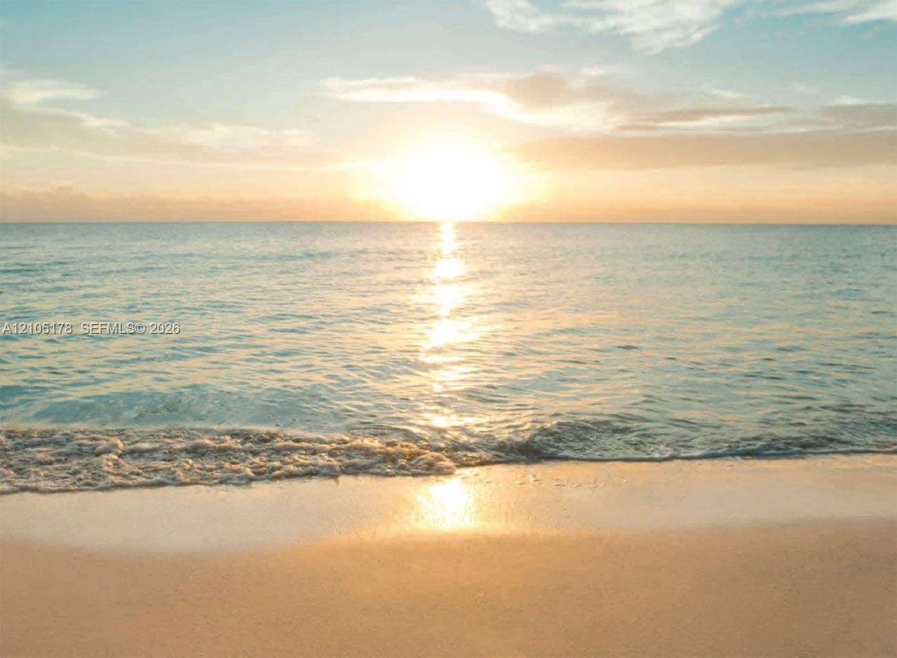 Sandy shoreline featuring direct ocean access