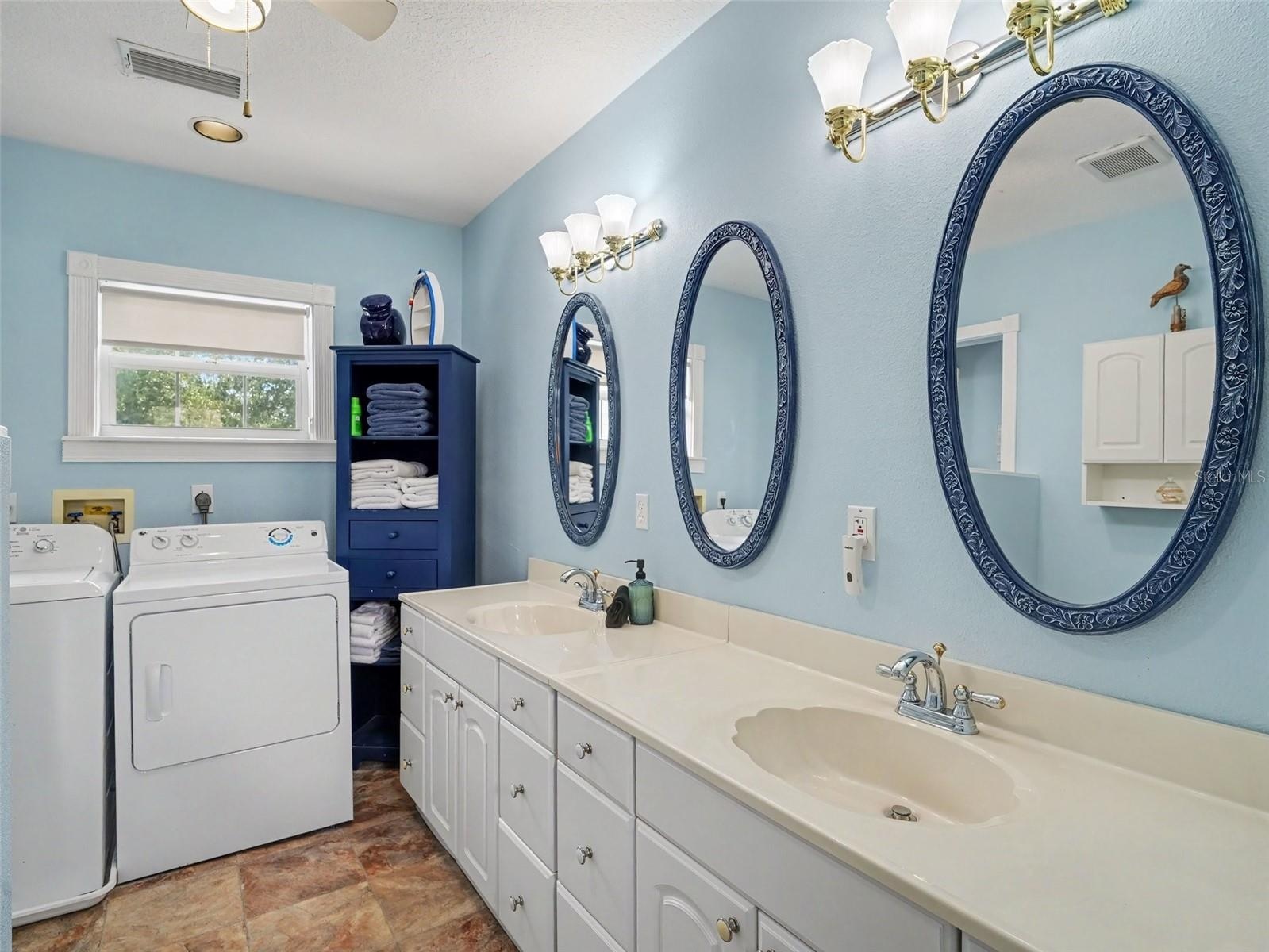Primary bedroom with laundry