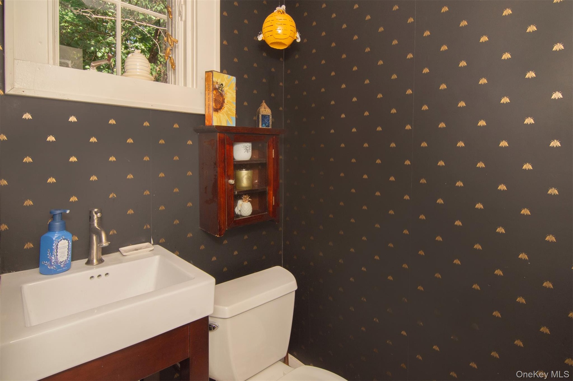 Powder room in foyer.