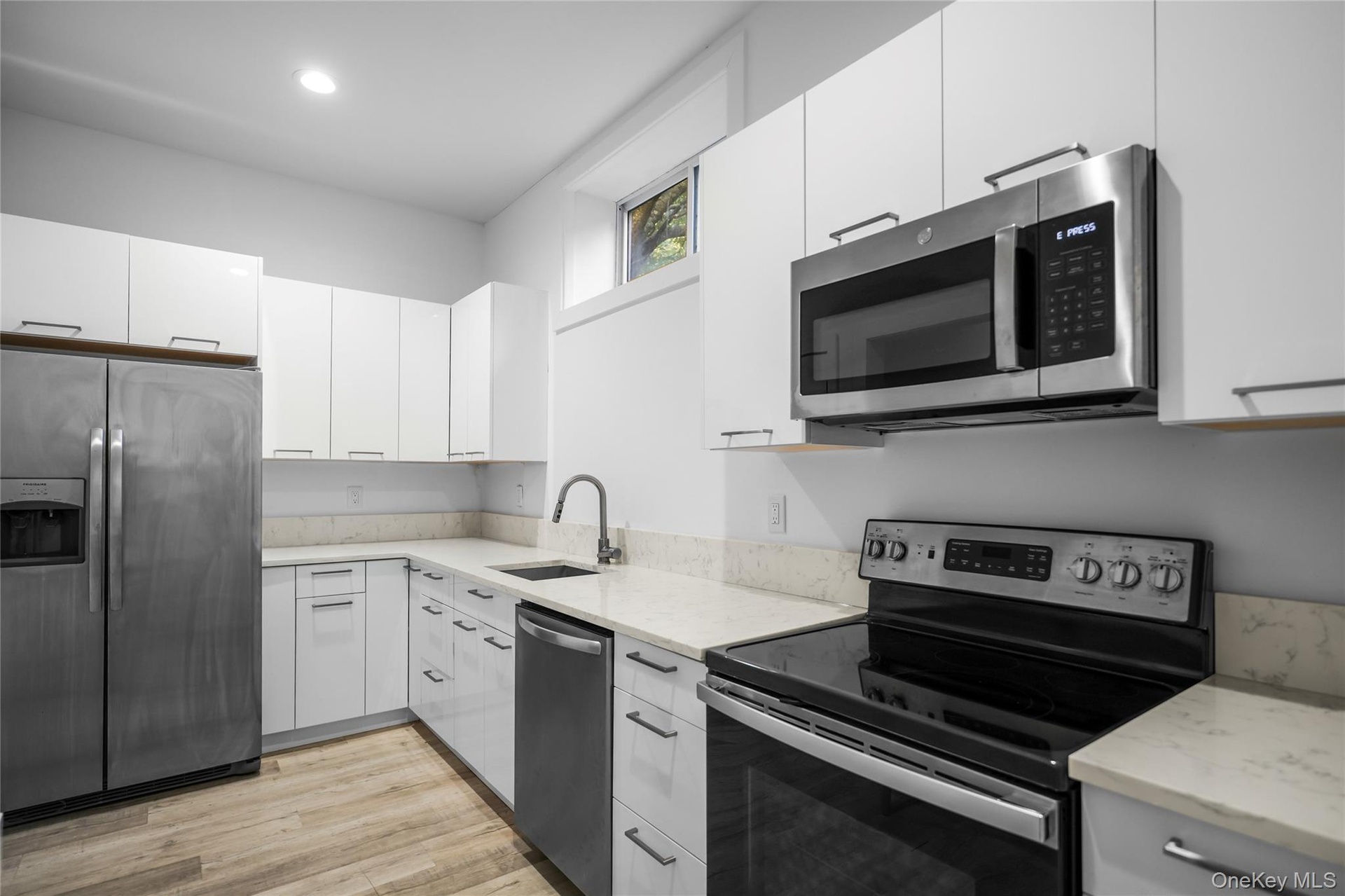 Lower level kitchen (digitally enhanced)