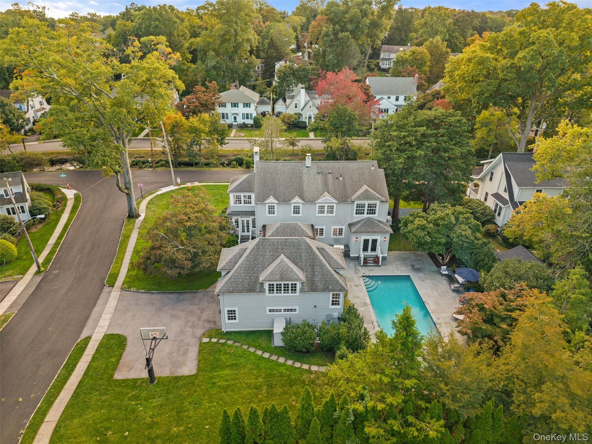 Aerial view from back of structure featuring the expansive backyard and pool area